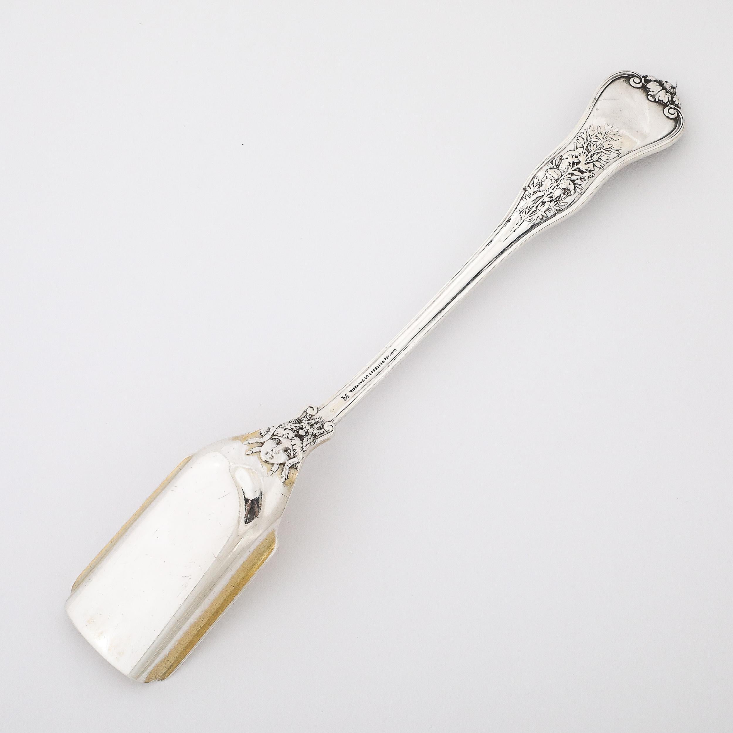 Late 19th Century Tiffany and Co. 19th Century Sterling and Gold Serving Spoon in Olympian Pattern For Sale