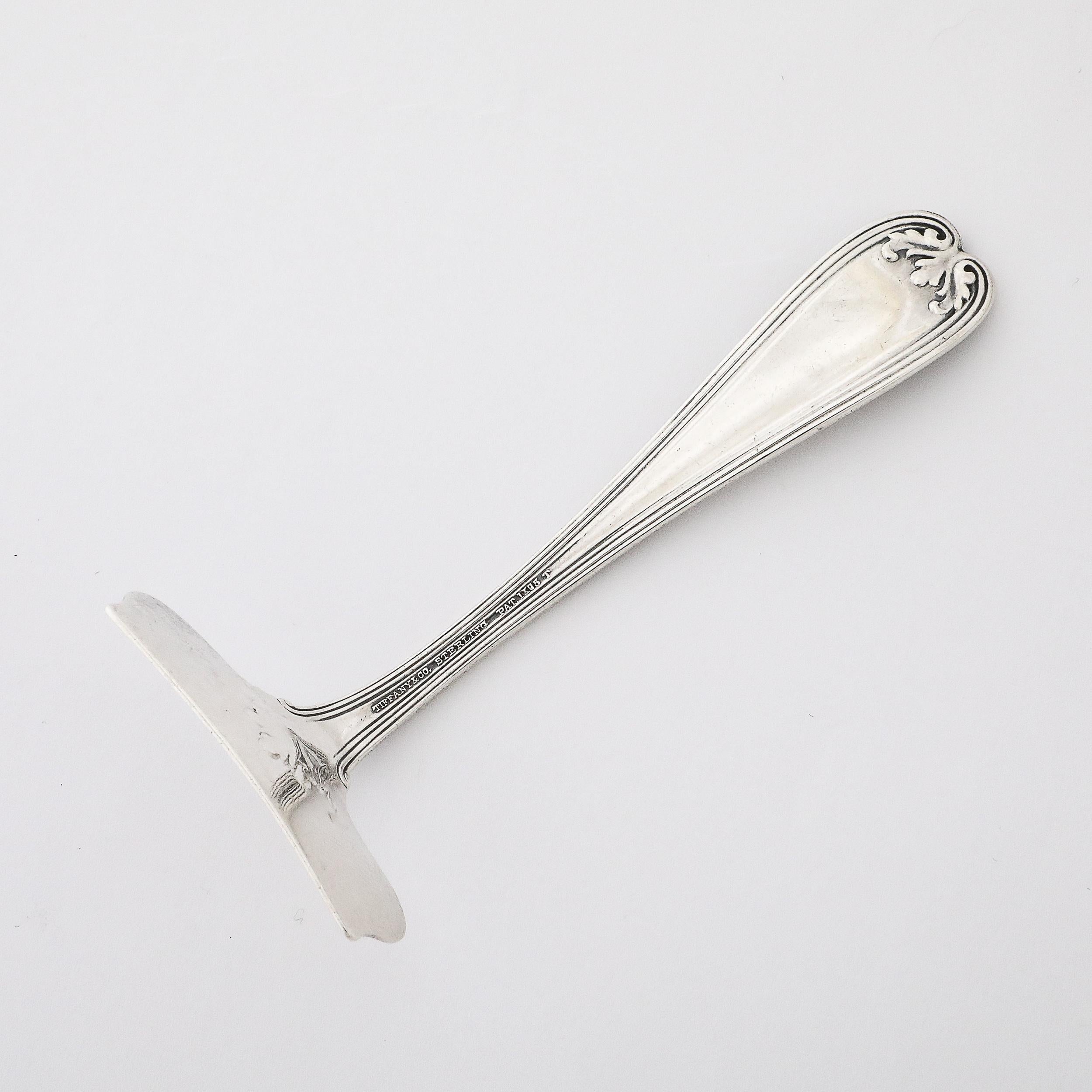 This lovely and beautifully formed Tiffany and Co.19th Century Sterling Silver Food Pusher Pat. IX95 T originates from the United States during the late 19th Century. A rare utensil originating from victorian society where it was considered rude for