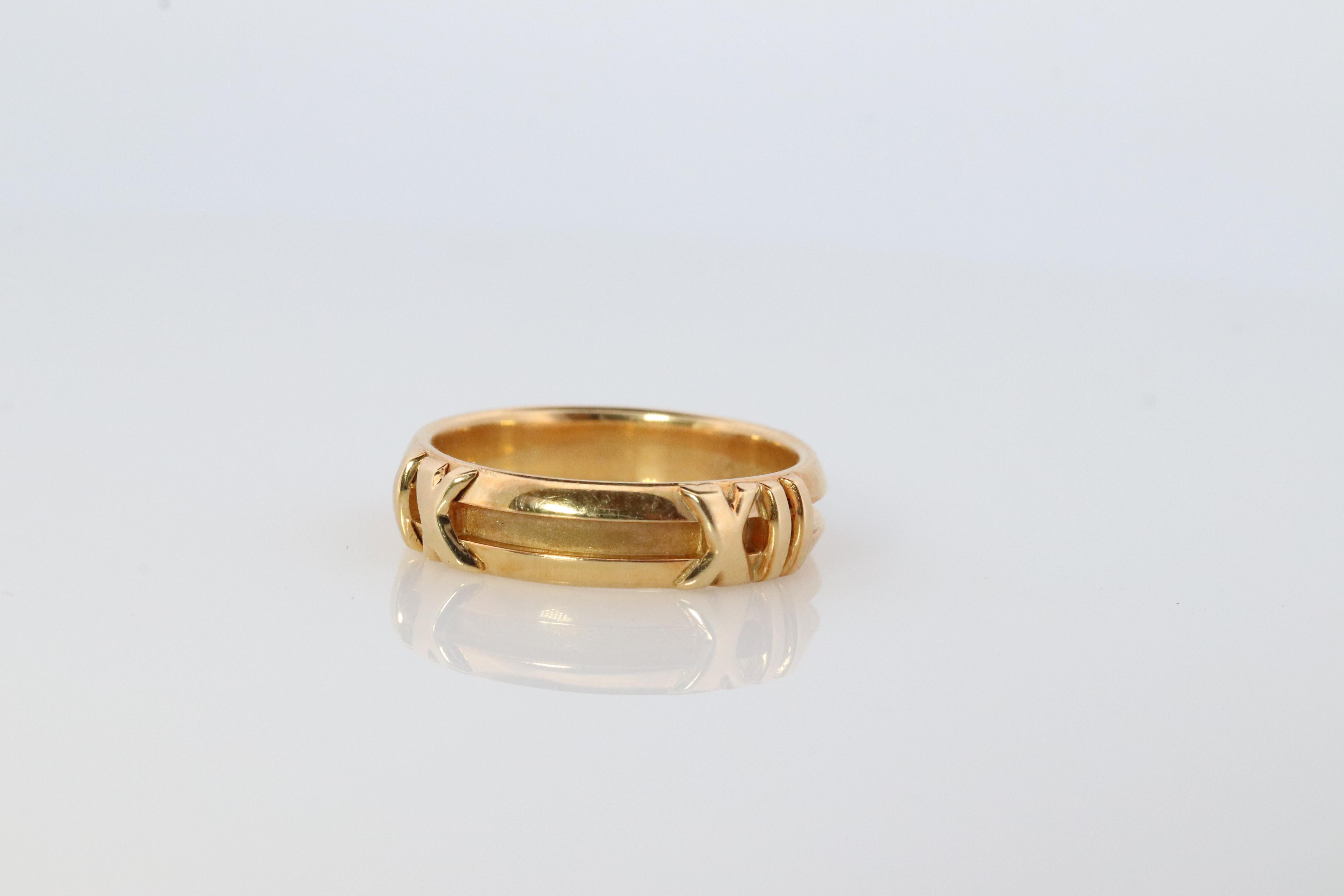 Rara banda ancha de oro amarillo de 18 quilates Tiffany & Co.

Números romanos Atlas

Estado: Viene con bolsa de Tiffany

Detalles:

Talla 5.5
5 mm de ancho