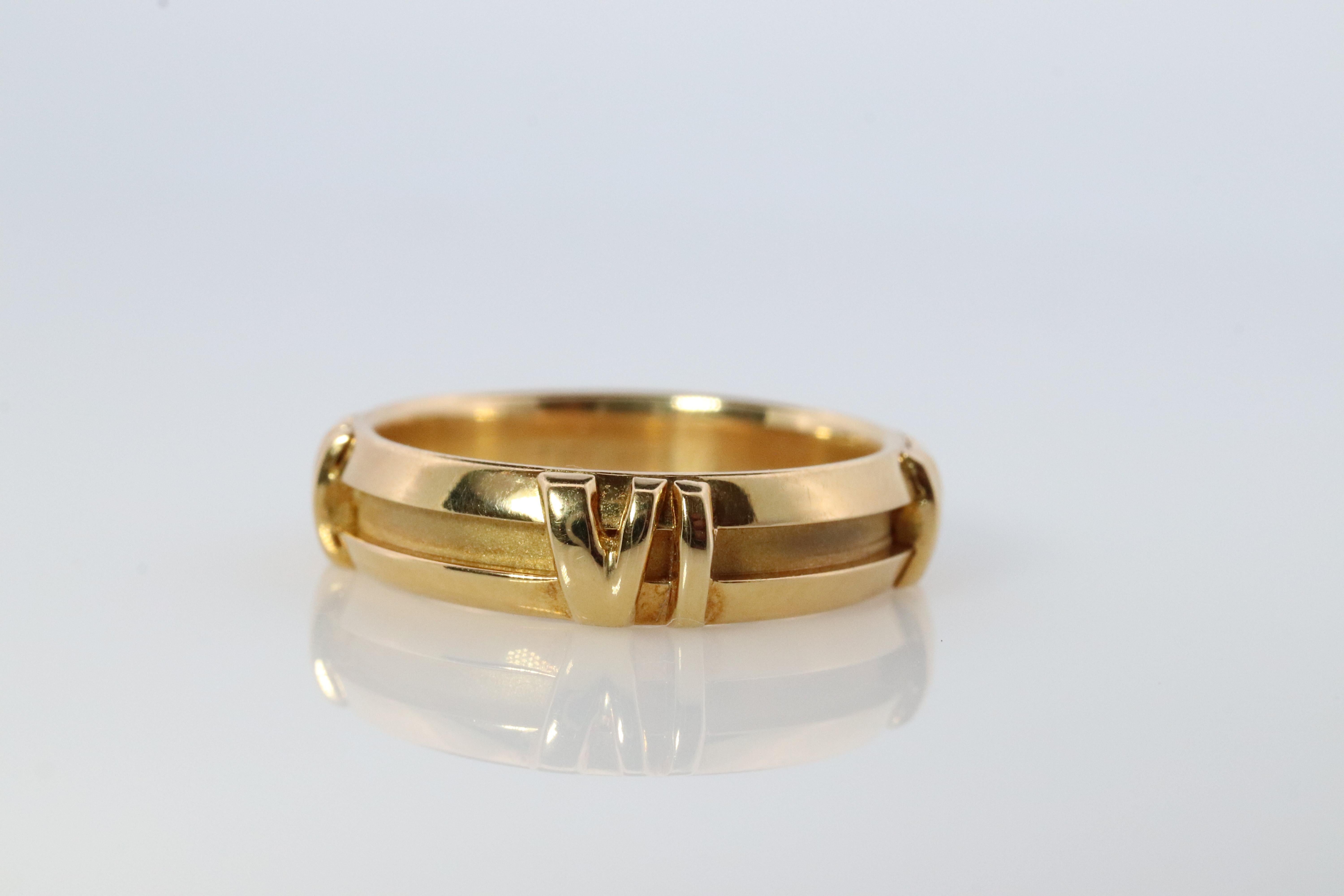 De las mujeres Tiffany & Co. Anillo Atlas. Pulsera auténtica de números romanos Tiffany de oro amarillo de 18 quilates. en venta