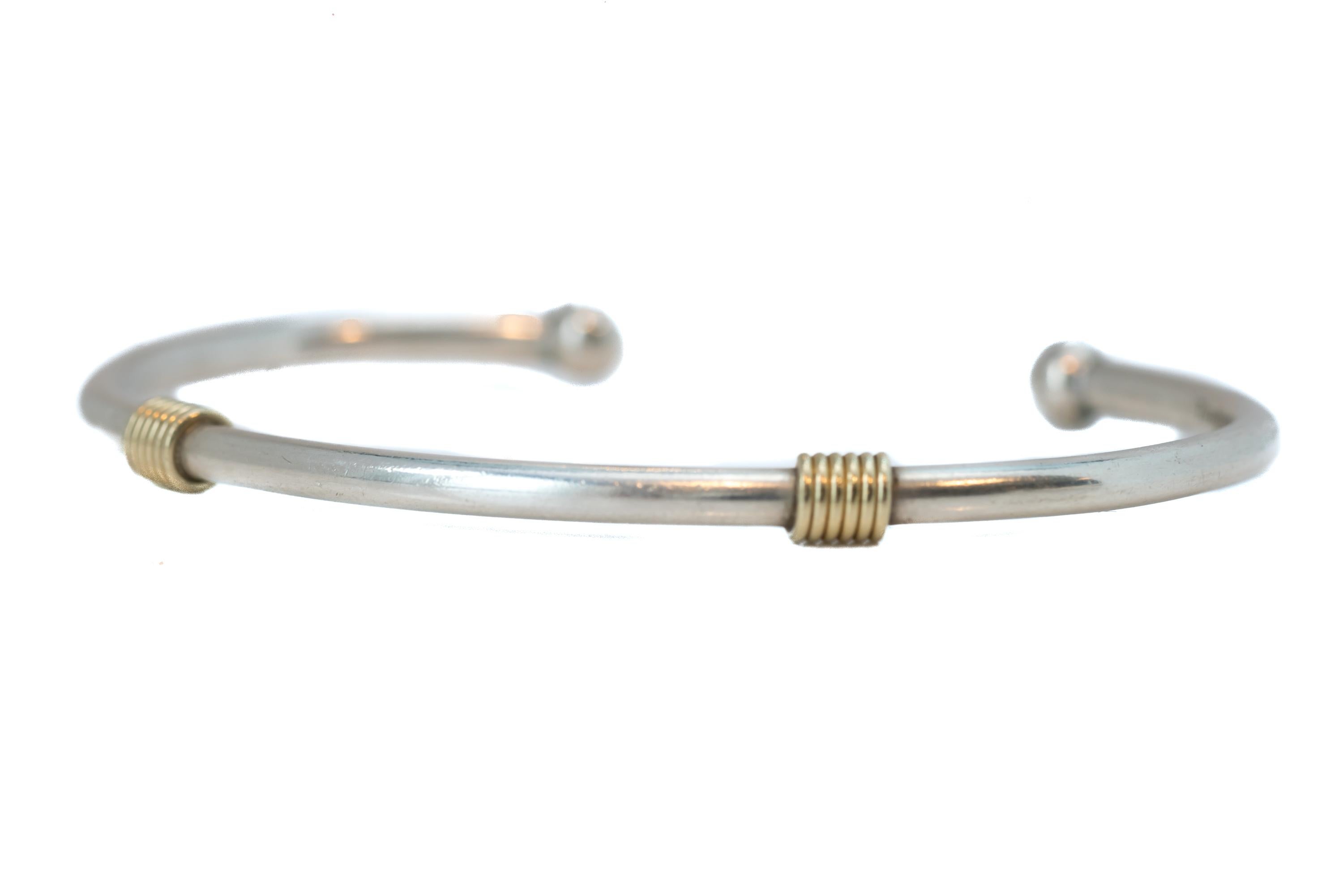 Contemporary Tiffany and Co. Bangle Bracelet in Sterling Silver and 18 Karat Yellow Gold