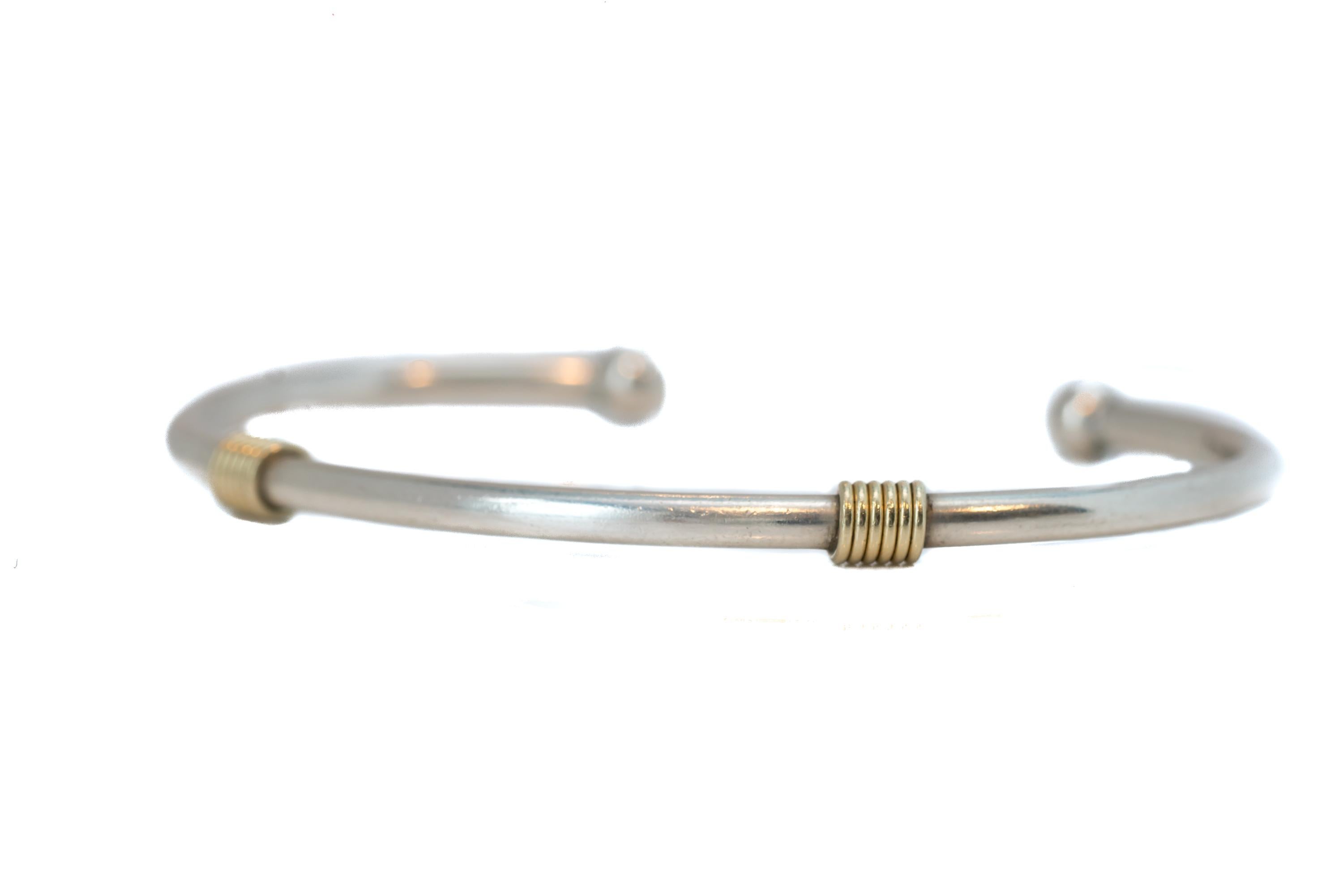 Tiffany and Co. Bangle Bracelet in Sterling Silver and 18 Karat Yellow Gold In Good Condition In Atlanta, GA