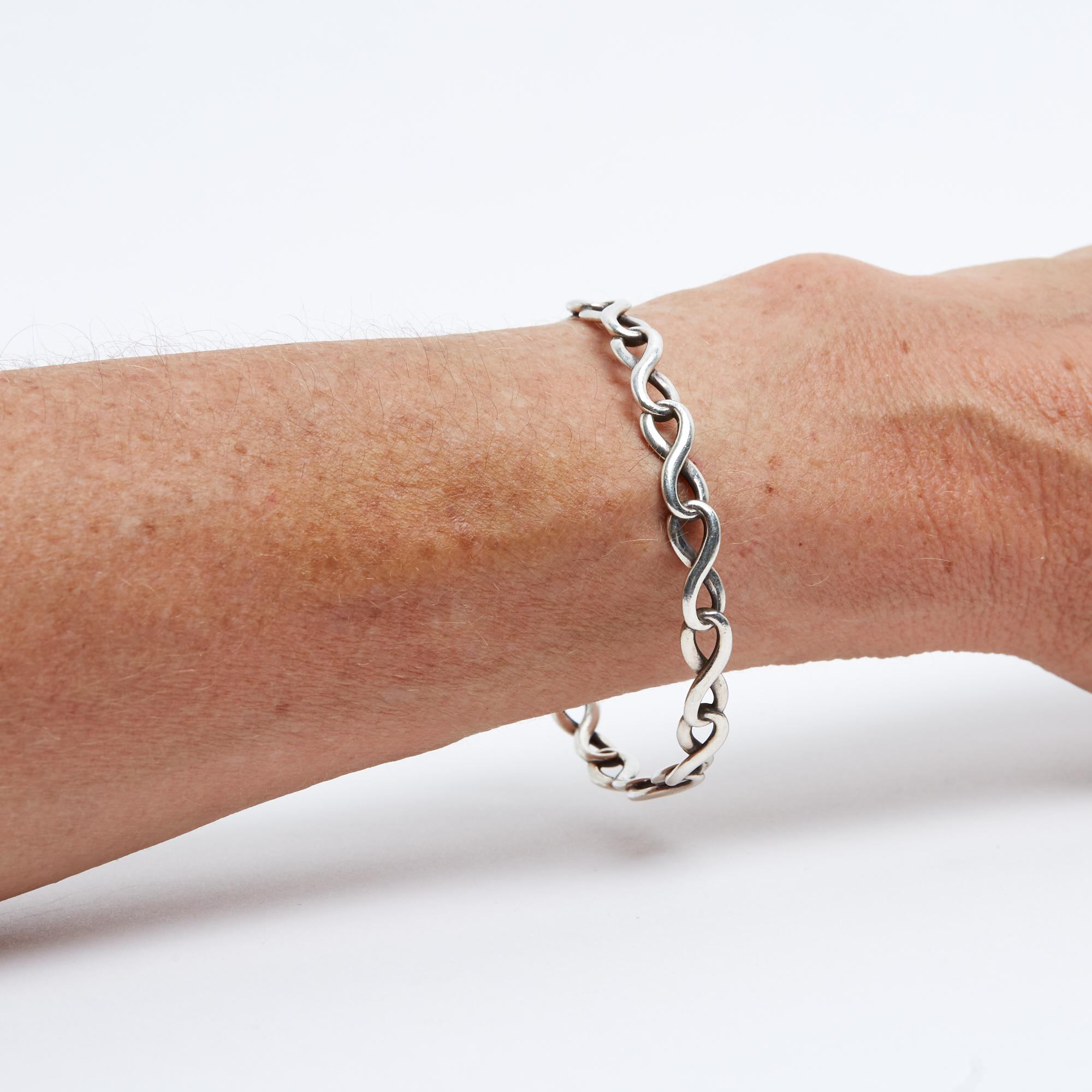 da uomo o donna Tiffany & Co Bracciale Infinity in argento Sterling Bracciale Bangle Tiffany & Co. in vendita