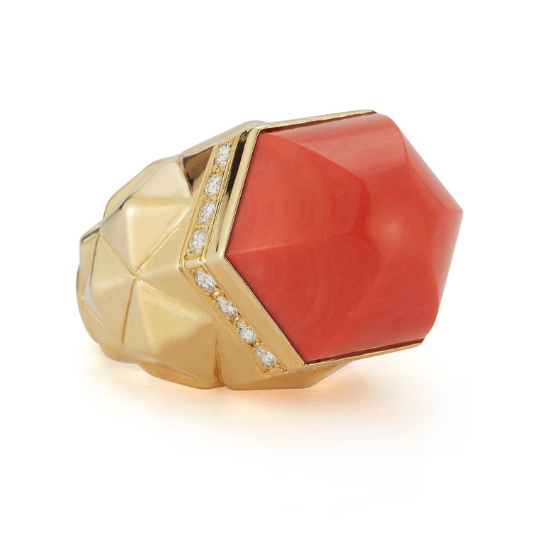Tiffany and Co Coral & Diamond Dome Ring

1 dome shaped coral with round cut diamonds approximately .70 cts set in 18k yellow gold 

Ring Size: 8.75

Re sizable free of charge 
