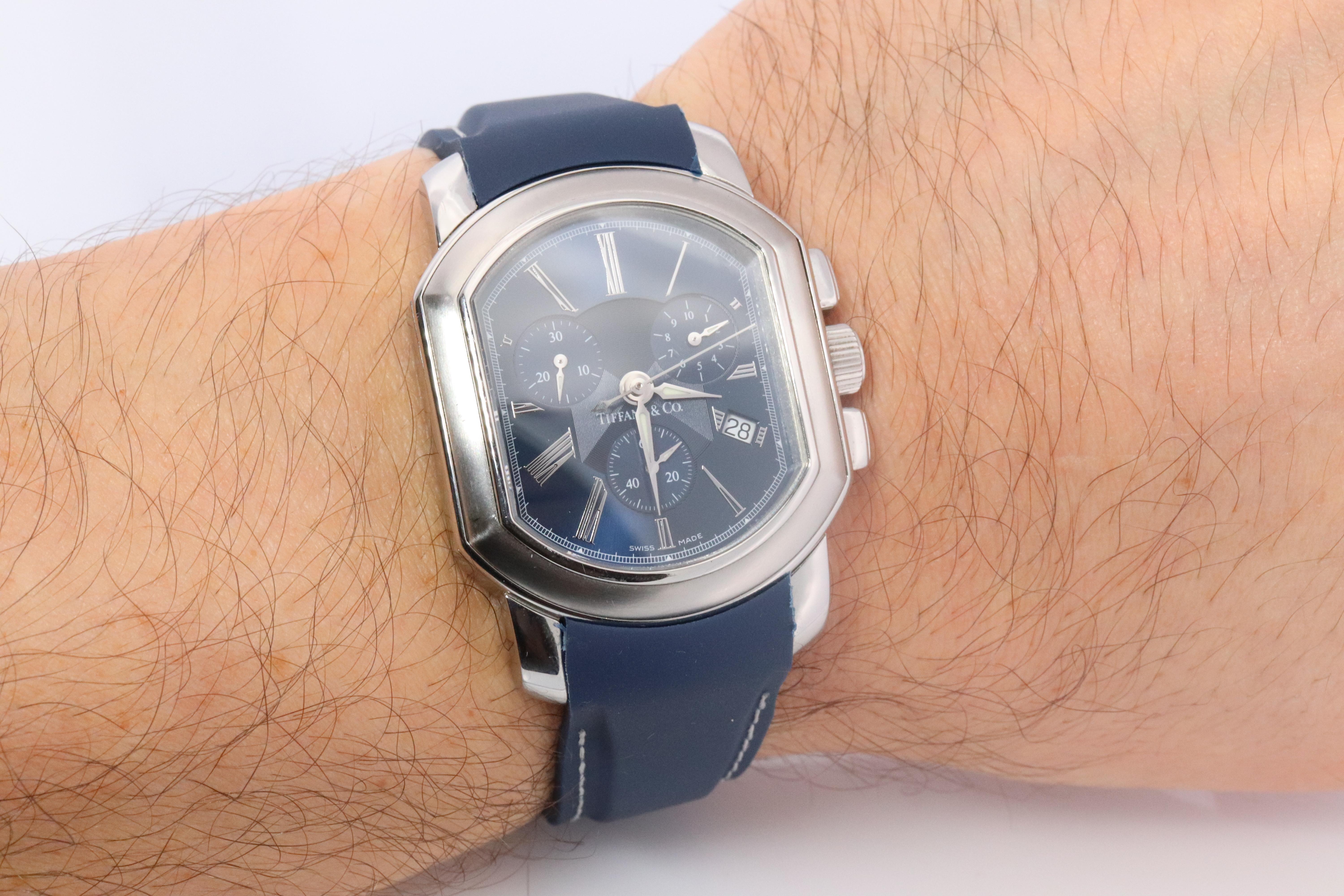Tiffany and Co Coupe Watch

Mens Coupe Resonator Chronograph

Stainless Steel with Beautiful Blue Dial. 
33mm by 38mm Case

Awesome Mens Dress Watch.

New Silicone Blue Band with Deployment Clasp.

Original Stainless Steel tiffany Bracelet is