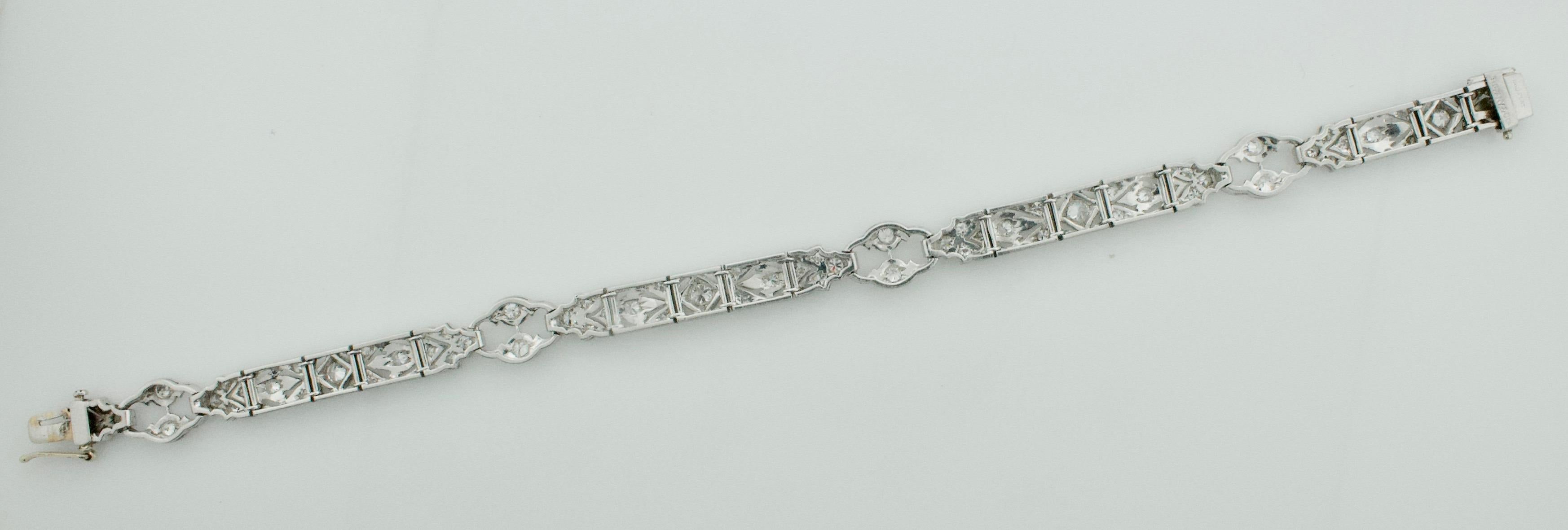 Tiffany and Co. Diamond Bracelet in Platinum Circa 1930's

Sixty Eight Round Brilliant Cut Diamonds weighing 2.35 carats approximately [GH VVS-Si1]

Length  7.25 inches  Width 8 mm