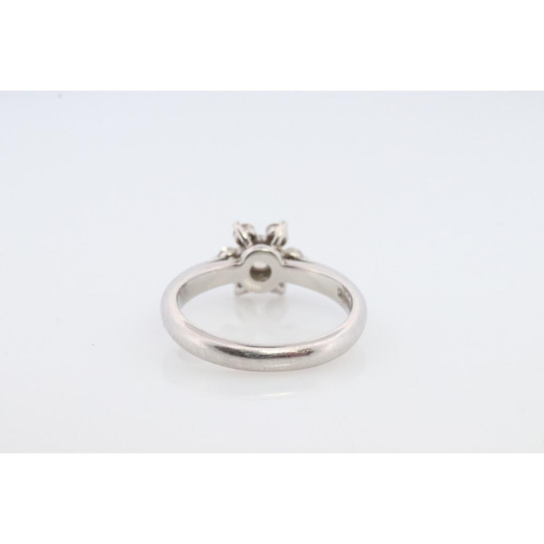 Women's Tiffany and Co. Diamond Ring. Platinum Flower Diamond Band. Tiffany and Company For Sale