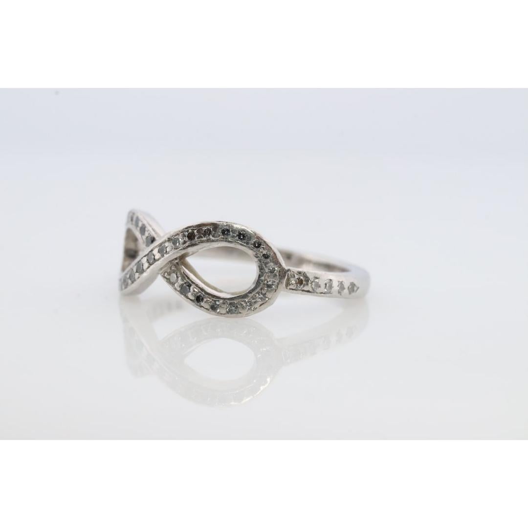 Tiffany and Co. Diamond Ring. Platinum Infinity Diamond Band. Infinity Loop For Sale 5