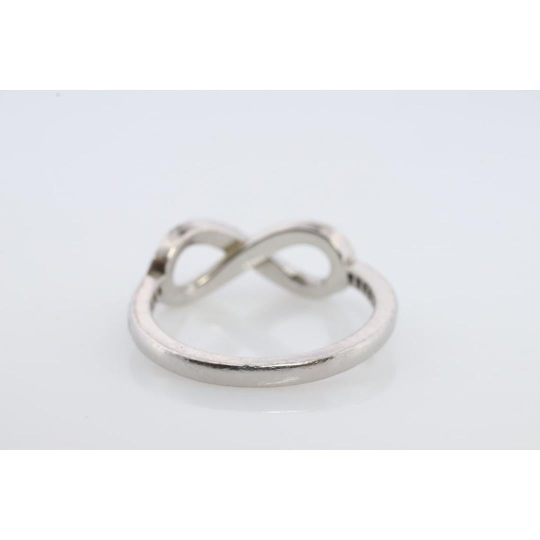 Tiffany and Co. Diamond Ring. Platinum Infinity Diamond Band. Infinity Loop For Sale 3