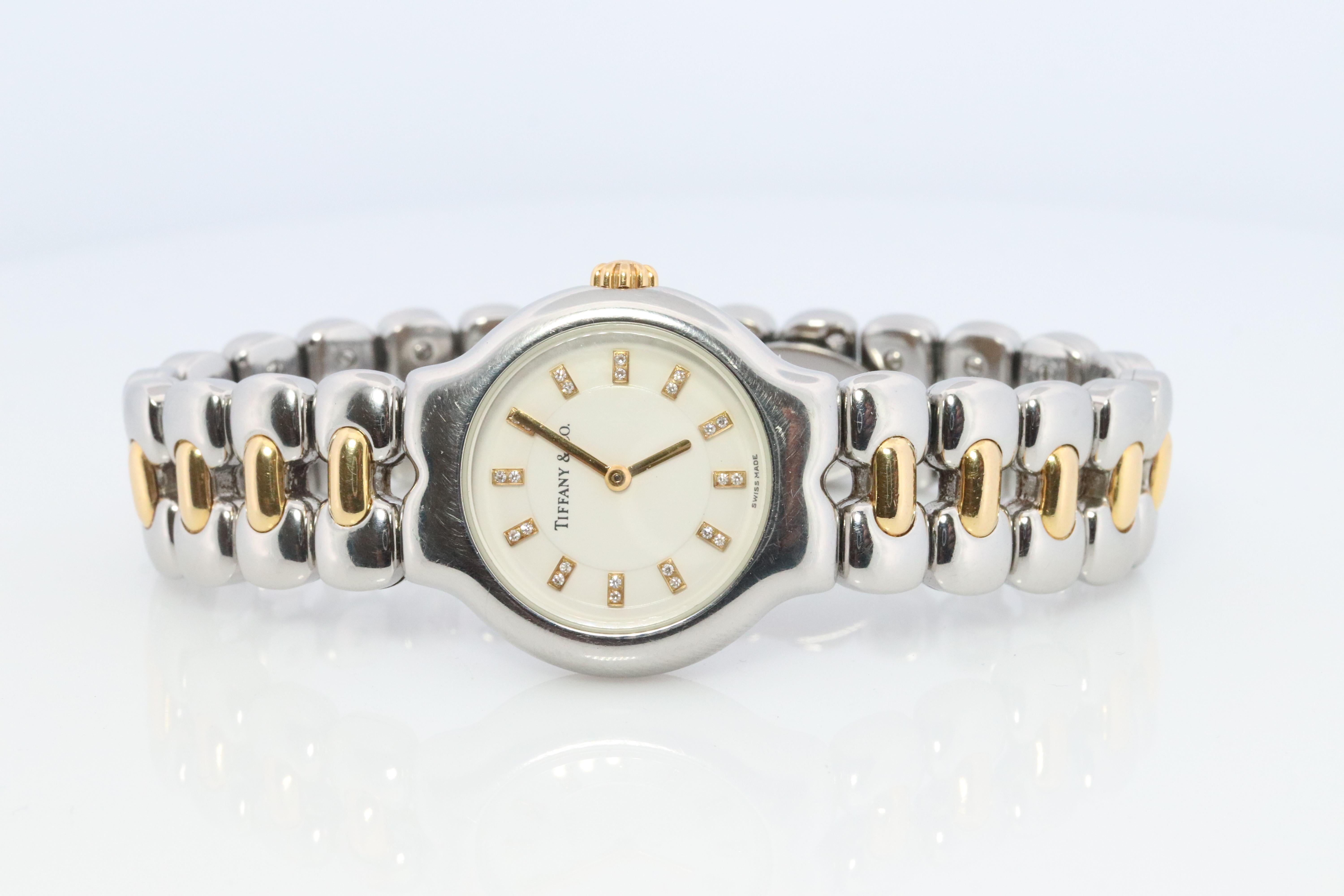 Modern Tiffany and Co Diamond Watch. 18k Tiffany Tesoro Stainless Steel Ladies 25mm.
