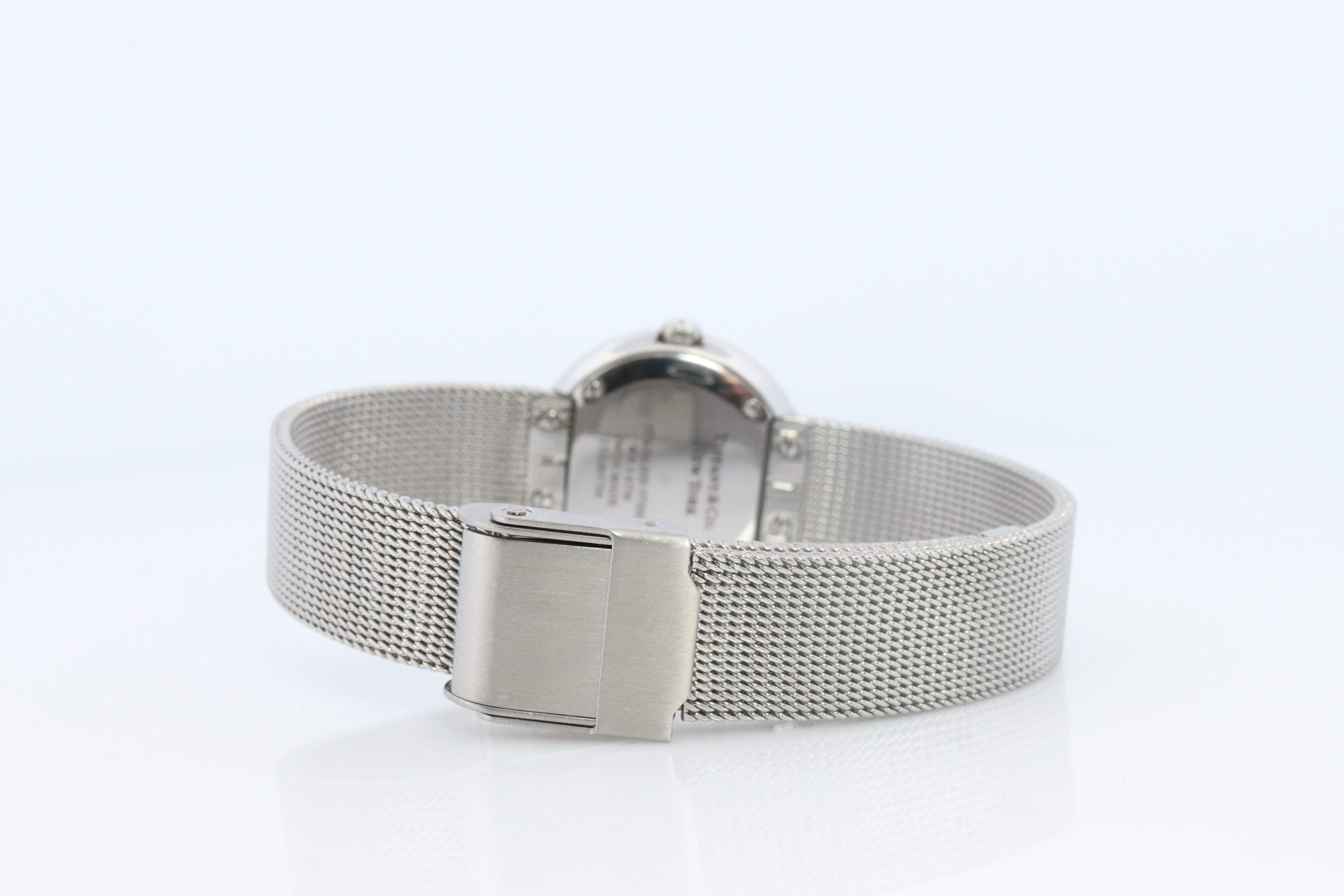 Round Cut Tiffany and Co Diamond Watch. Tiffany Atlas Diamond Bezel 24mm Ladies Watch. For Sale