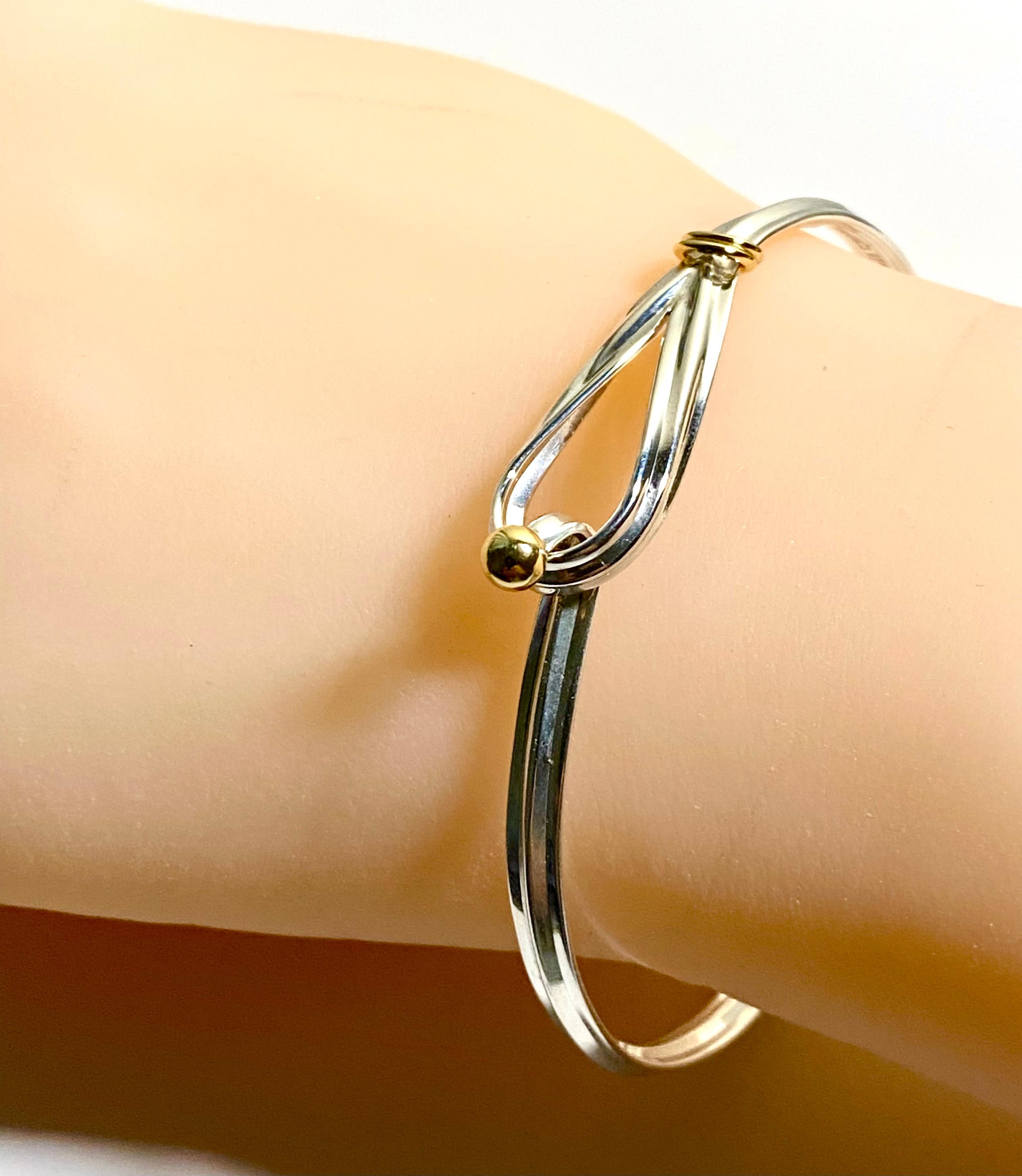 Tiffany & Co Eighteen Karat Yellow Gold and Silver Hook Bracelet In Good Condition In New York, NY