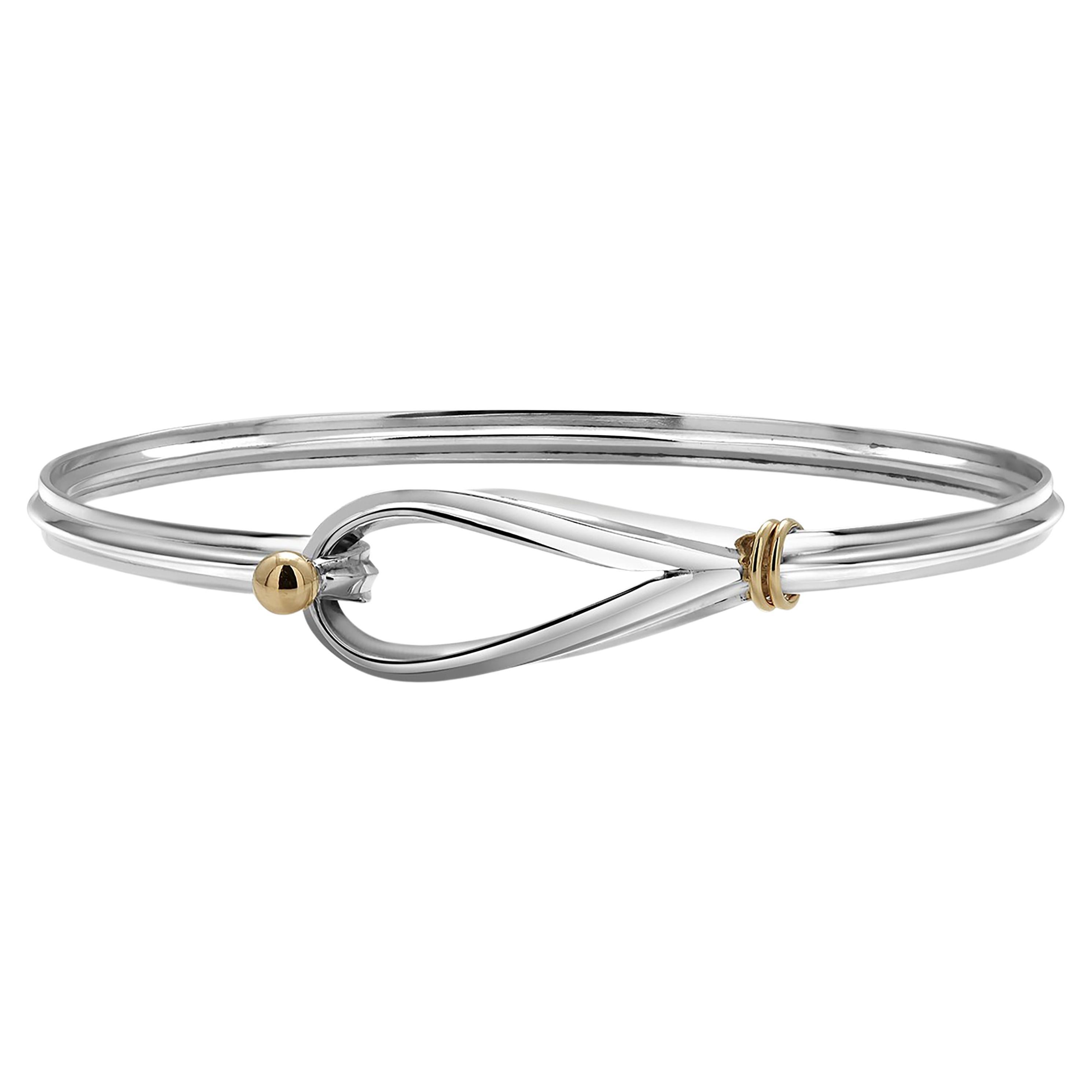 Tiffany and Co Eighteen Karat Yellow Gold and Silver Hook Bracelet at  1stDibs  tiffany hook and eye bangle, tiffany hook bracelet, tiffany hook  and eye bracelet