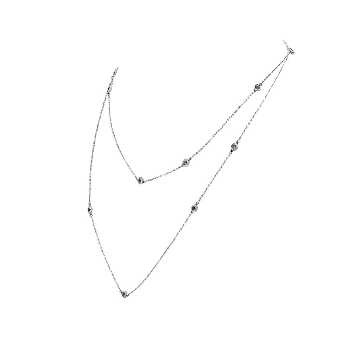 This necklace features 12 round aquamarines set in sterling silver. 36