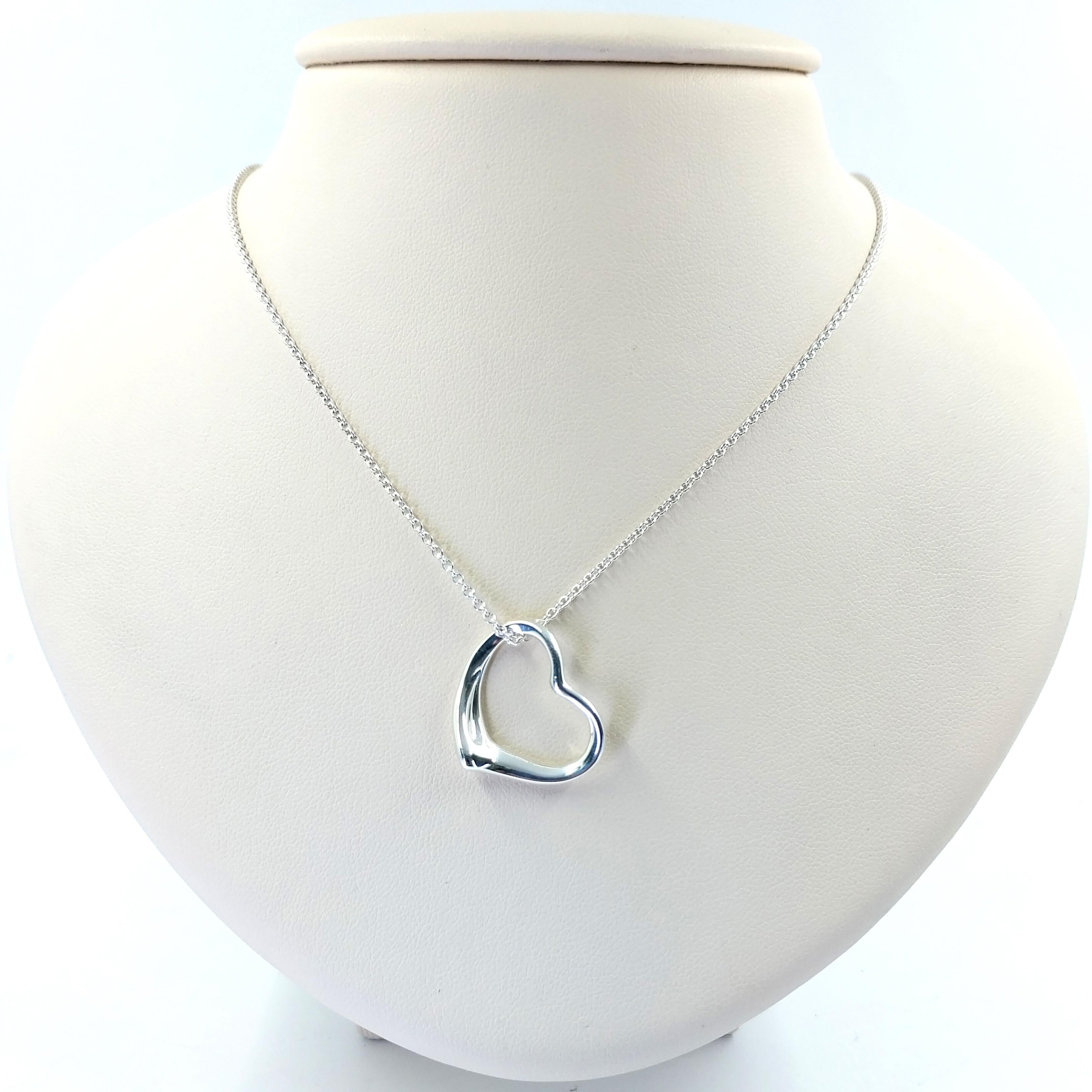 Pre-Owned Tiffany & Co Elsa Peretti Sterling Silver Open Heart Pendant Necklace. 18 Inch Length. $600 MSRP. Includes Tiffany pouch.