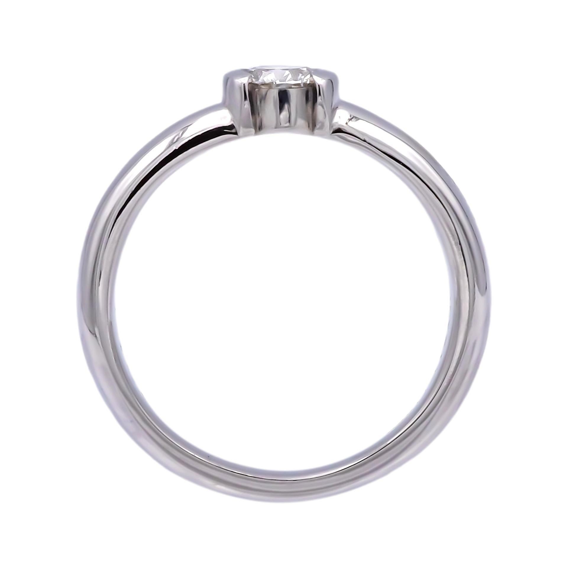 Contemporary Tiffany and Co. Etoile Platinum Round Diamond Engagement Ring .29ct For Sale