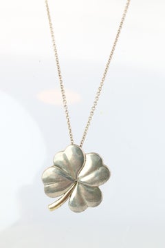 Tiffany and Co Four Leaf Clover Pendant. 18k and Sterling Silver