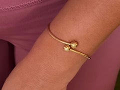 Tiffany & Co. Bracciale Ball Bypass in oro giallo 18k
