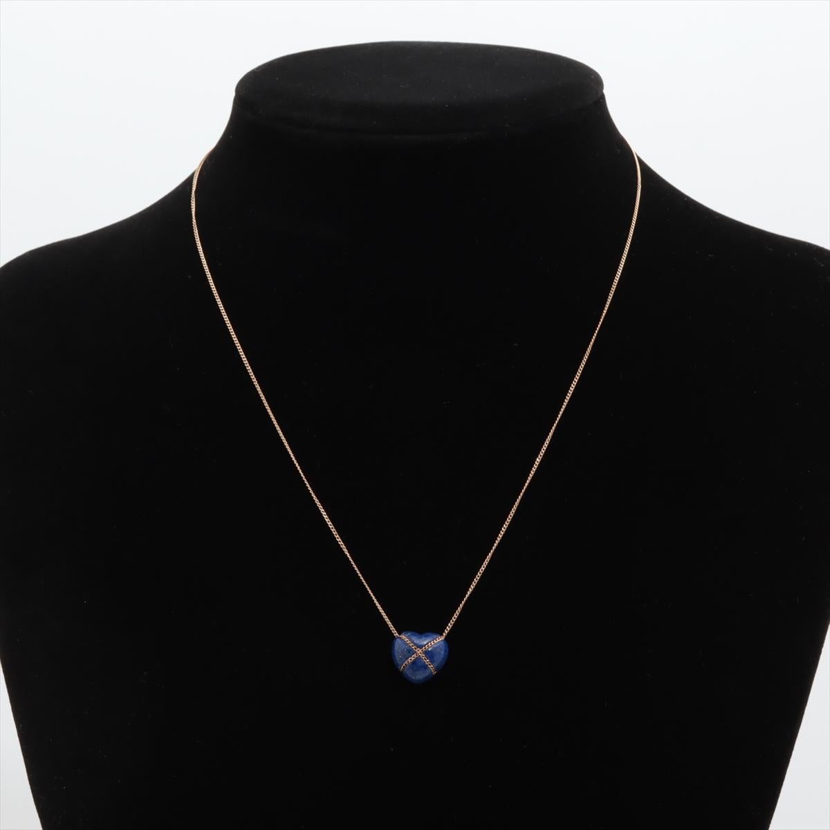 Genuine Tiffany and Co.
Elsa Peretti 
Lapis Lazuli Carved Heart Pendant

14k Yellow Gold Chain

Minor signs of wear.

Details
12mm by 13mm Heart Pendant
18in Necklace length