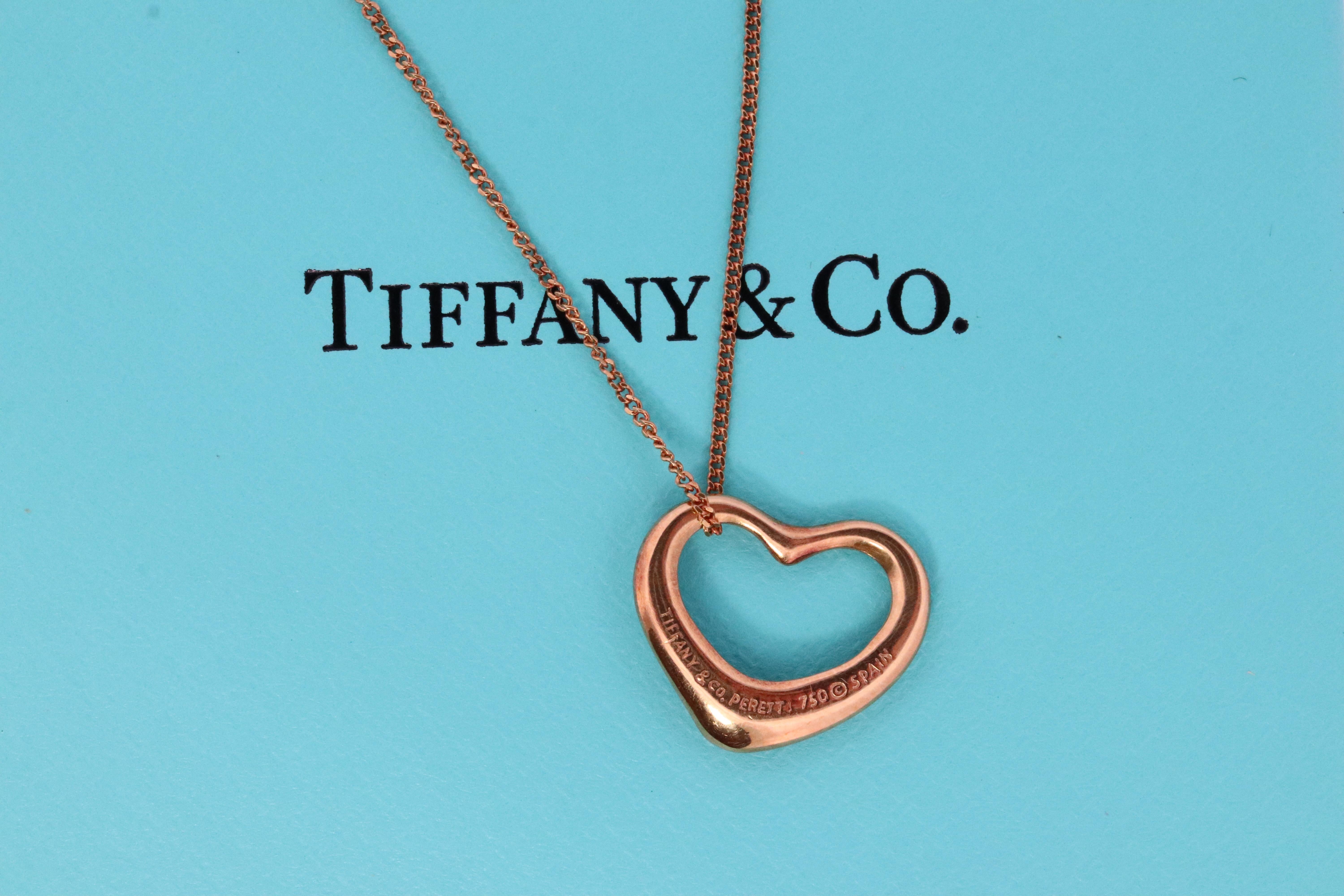 Genuine Tiffany and Co.  Elsa Peretti Heart Pendant 18k 750 Gold

Minor signs of wear. Will come with Tiffany pouch.

Details
16in Unoaerre 18k Curb Chain Necklace
12mm by 15mm Heart Pendant