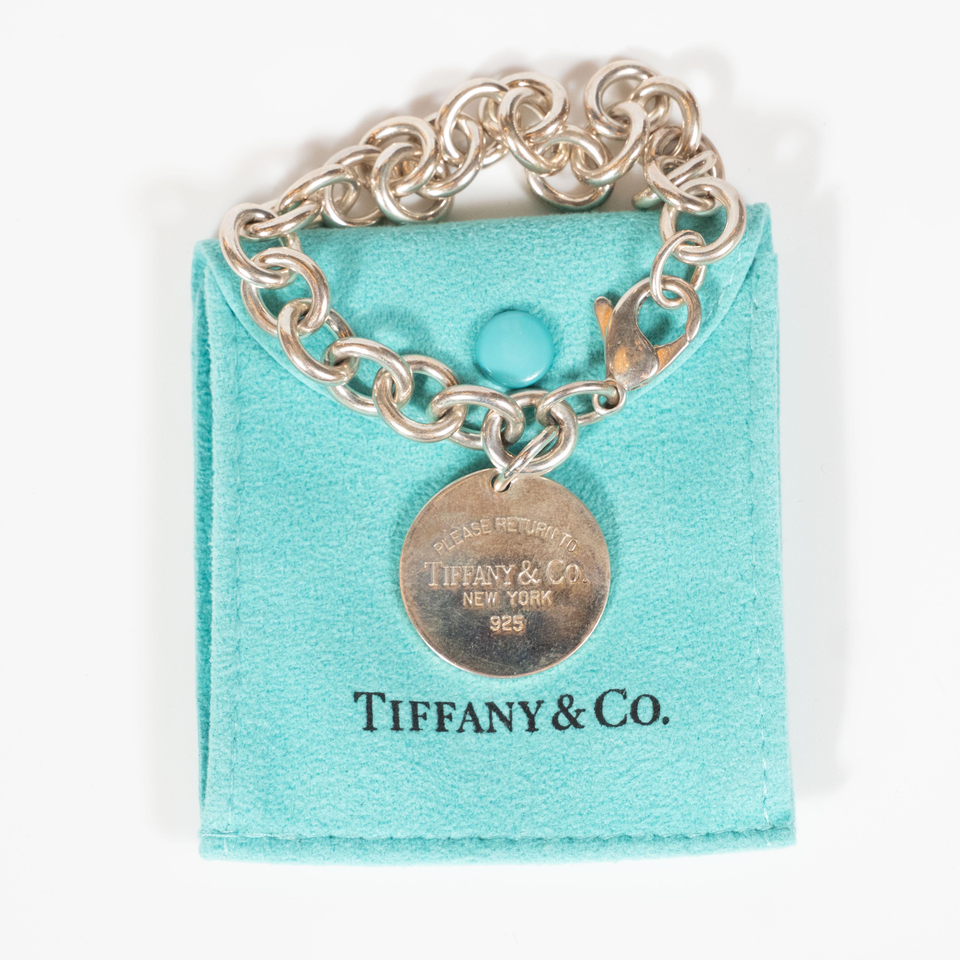 Tiffany & Co. Heart Tag Charm Bracelet In Excellent Condition For Sale In New York, NY