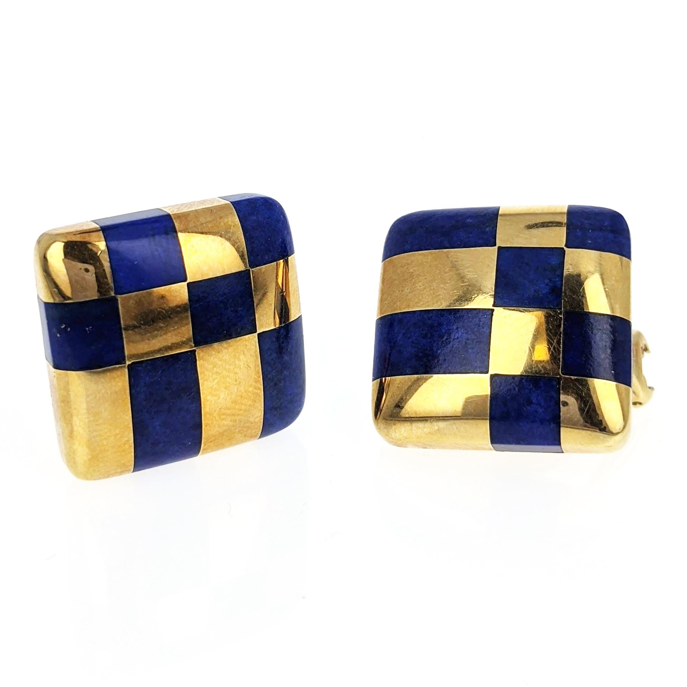 These beautiful earrings by Tiffany and Co. are mounted in 18 karat yellow gold with lapis lazuli inlay in a checkered design. They measure approximately 2 x 2 cm.