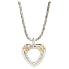 Tiffany and Co Open Heart Pendant. 18k and Sterling Silver