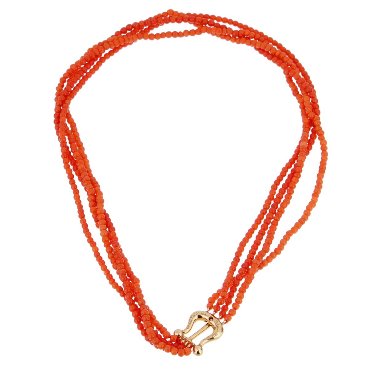 This gorgeous vintage Tiffany & Co. necklace features 4 strands of round natural coral beads measuring 3.0mm each and is completed with an 18k yellow gold clasp. Signed Paloma Picasso 1981