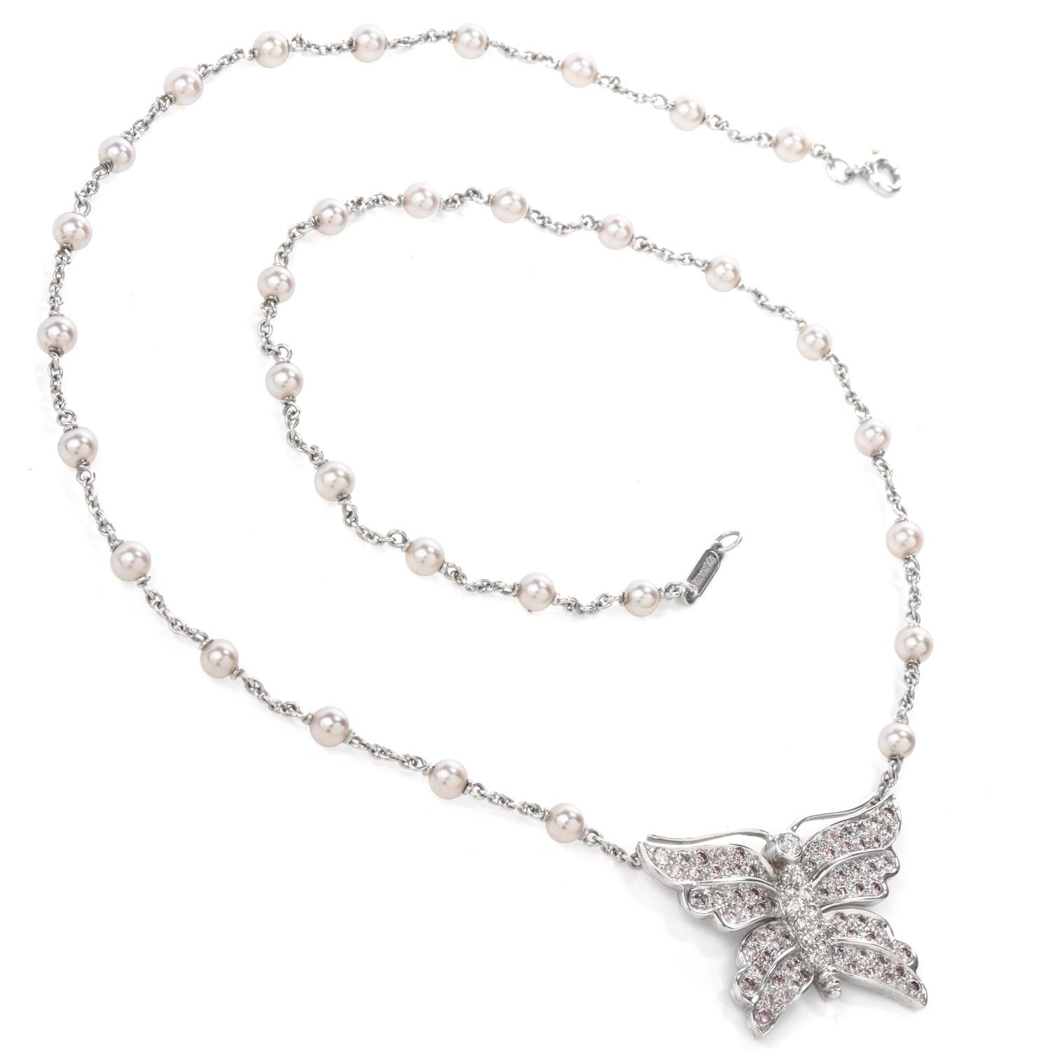 The Excellent Condition Tiffany and Co. Diamond and Akoya Salt Water Pearl necklace was inspired in a Butterfly motif and crafted in Platinum. Adorning throughout the body are Natural Fancy Pink and White Diamonds at a  combined weight of