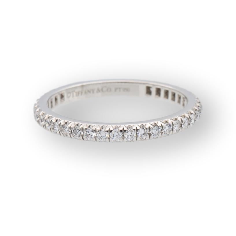 Tiffany & Co. eternity band from the Soleste collection finely crafted in Platinum featuring a full circle of round brilliant cut diamonds set in 4 prong 