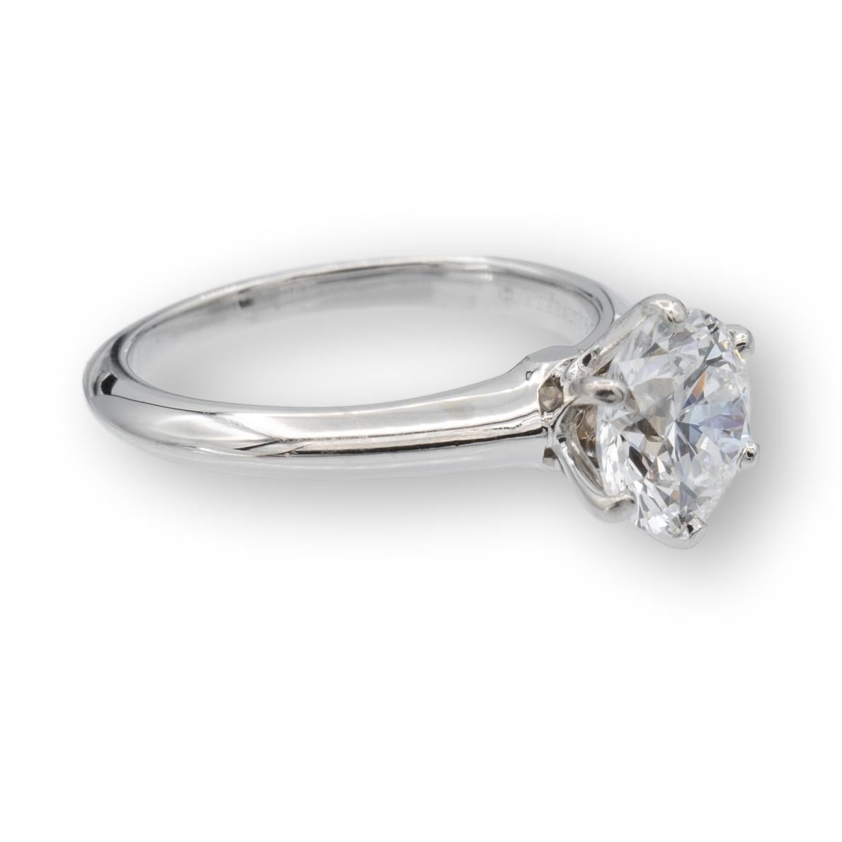 Tiffany and Co. engagement ring finely crafted in platinum featuring a round brilliant 1.70 ct diamond in a D color , SI1 clarity. The ring is accompanied by a certificate, appraisal and receipt from Tiffany. Ring is fully hallmarked with Tiffany