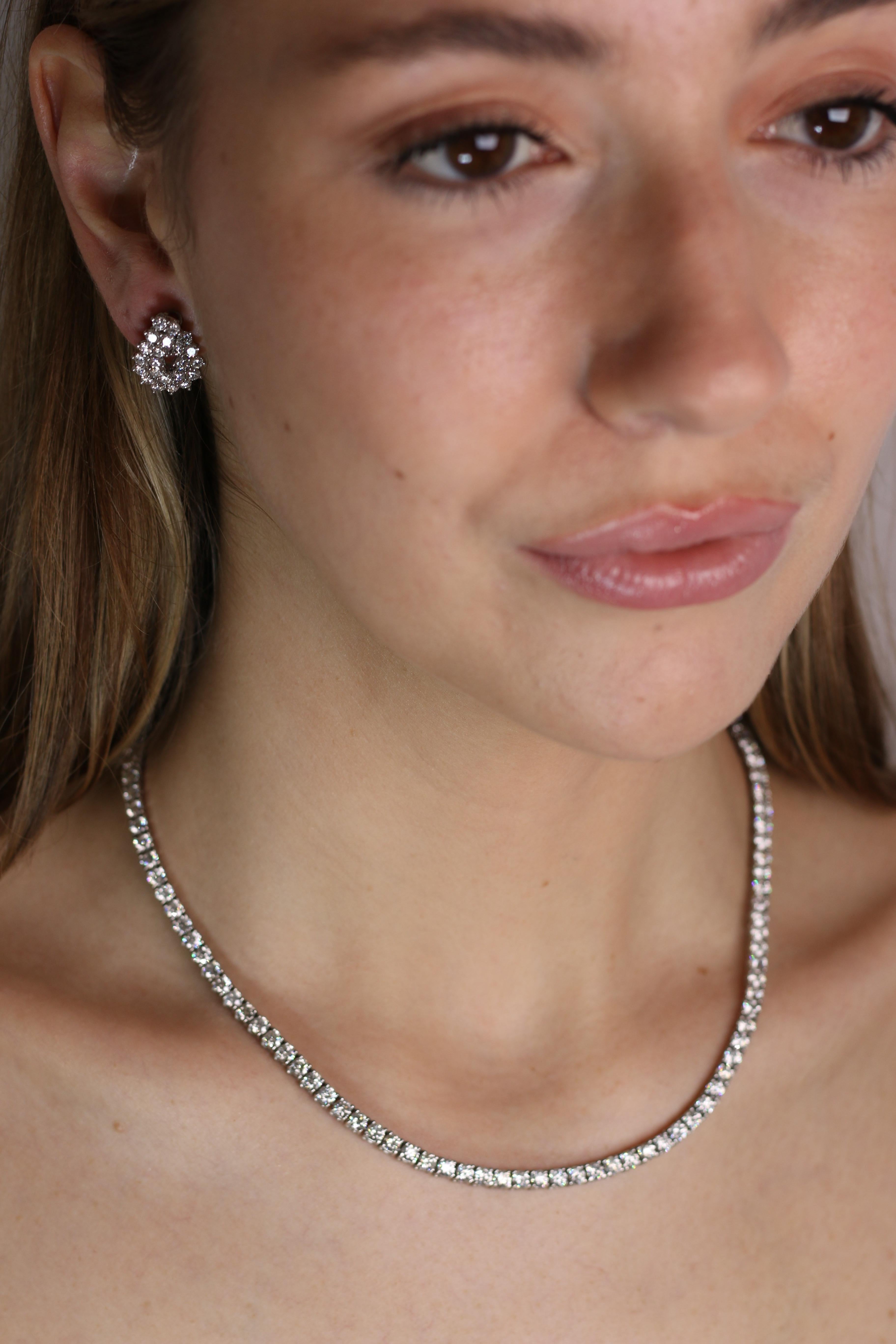 Tiffany and Co. Platinum Diamond Omega Clip Earrings In Excellent Condition For Sale In Dallas, TX