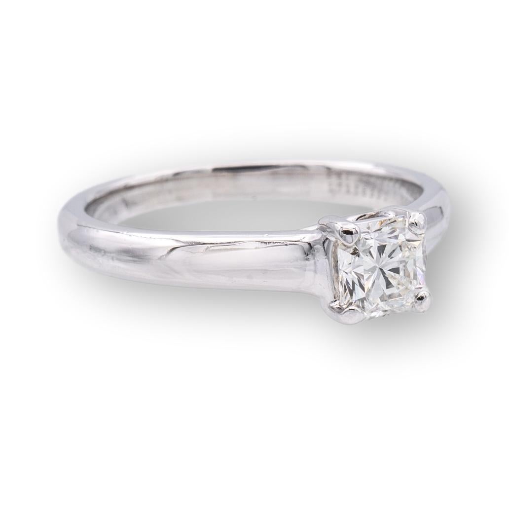 Tiffany & Co Lucida engagement ring finely crafted in Platinum featuring a 0.50 carat center H color VVS1 clarity. Fully hallmarked with logo, serial number and metal content.

Ring Specifications
Brand: Tiffany & Co.
Style: Lucida
Hallmark: Tiffany