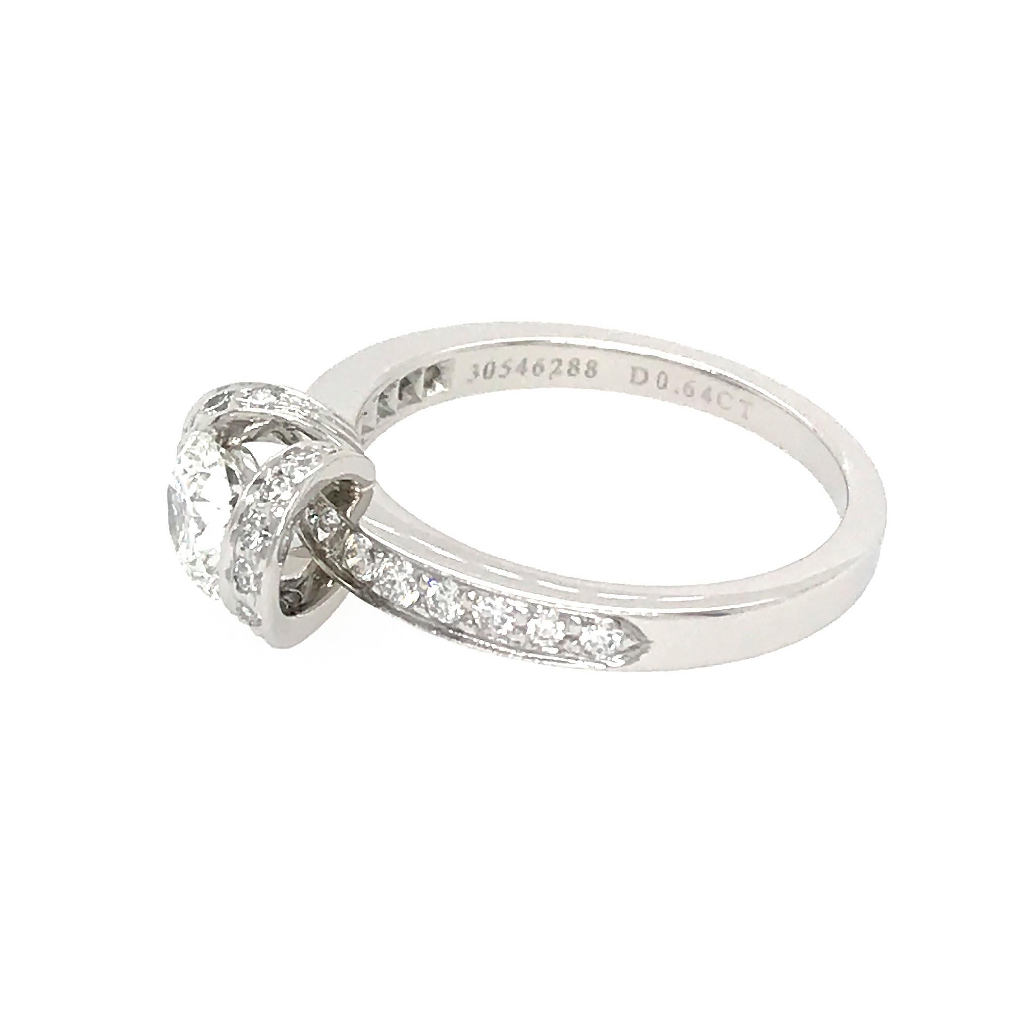 Round Cut Tiffany & Co. Platinum Ribbon Diamond Engagement Ring and Matching Wedding Ban