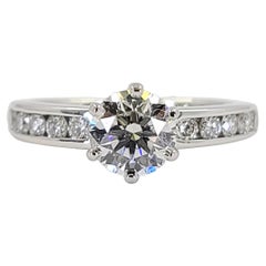 Tiffany and Co Platinum Round Diamond Engagement Ring with Channel Sidestones