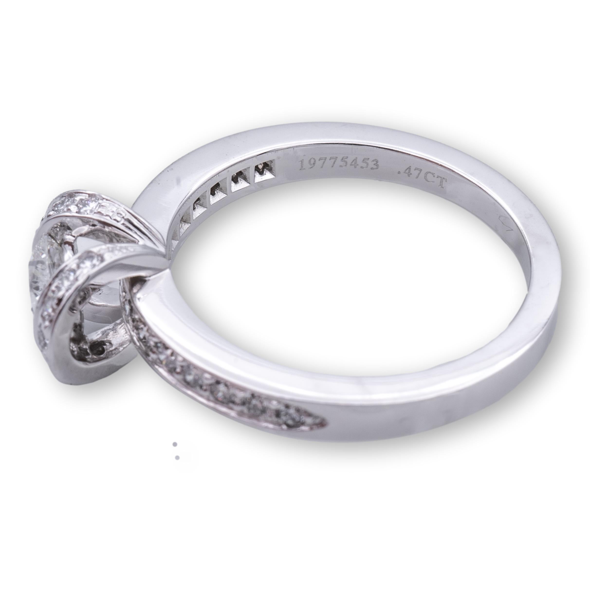 Tiffany and Co. Ribbon Platinum Diamond Engagement Ring .83ct Tw GVVS2 Round Cut In Excellent Condition In New York, NY