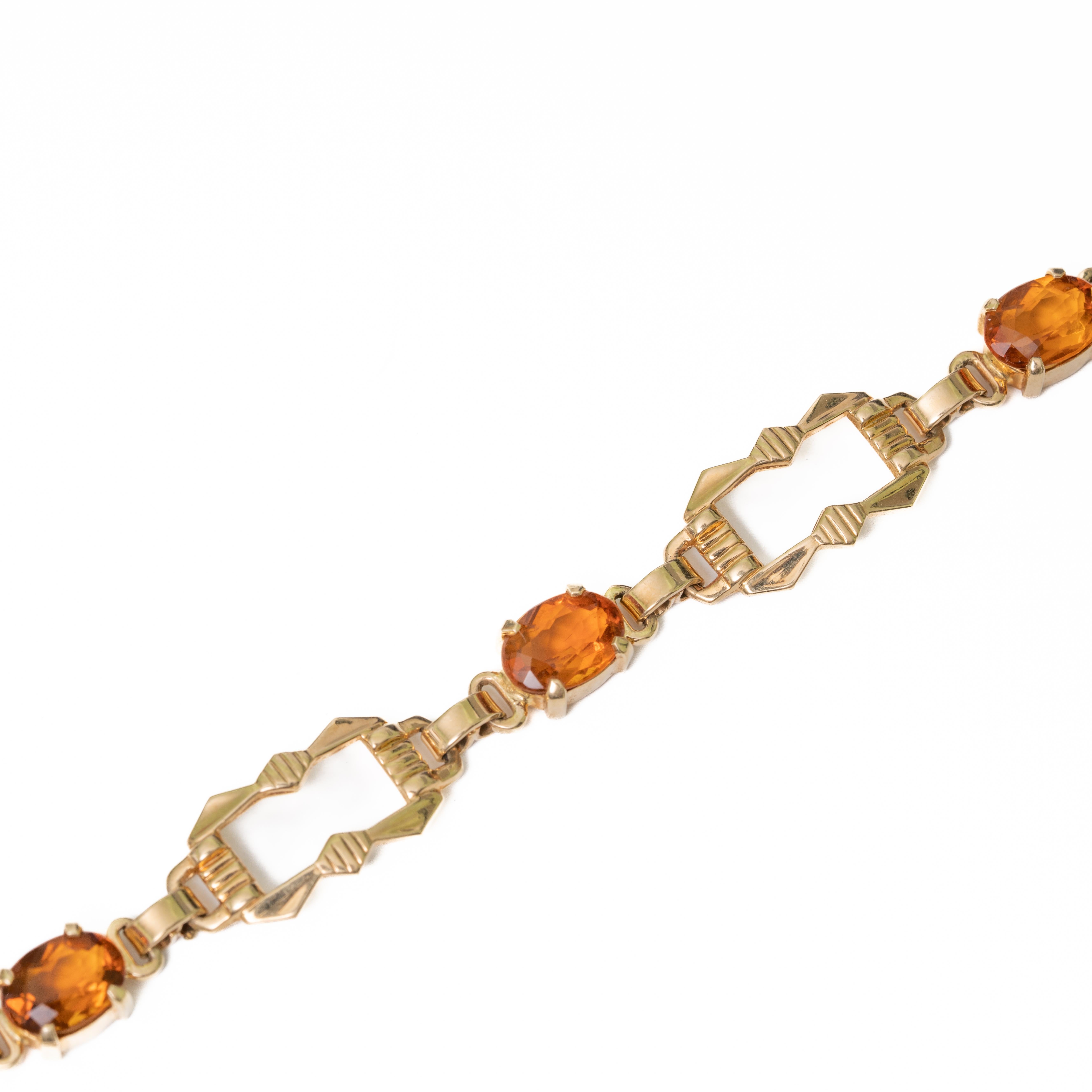 Tiffany and Co Signed Citrine Mounted 14K Gold,  Weinman Brothers Bracelet , c1940. Stamped 14k, WB, and Tiffany & Co.; three oval cut citrines; clasp stamped 14 KT. The ring weighs 11.8 grams and Measures 7 1/4