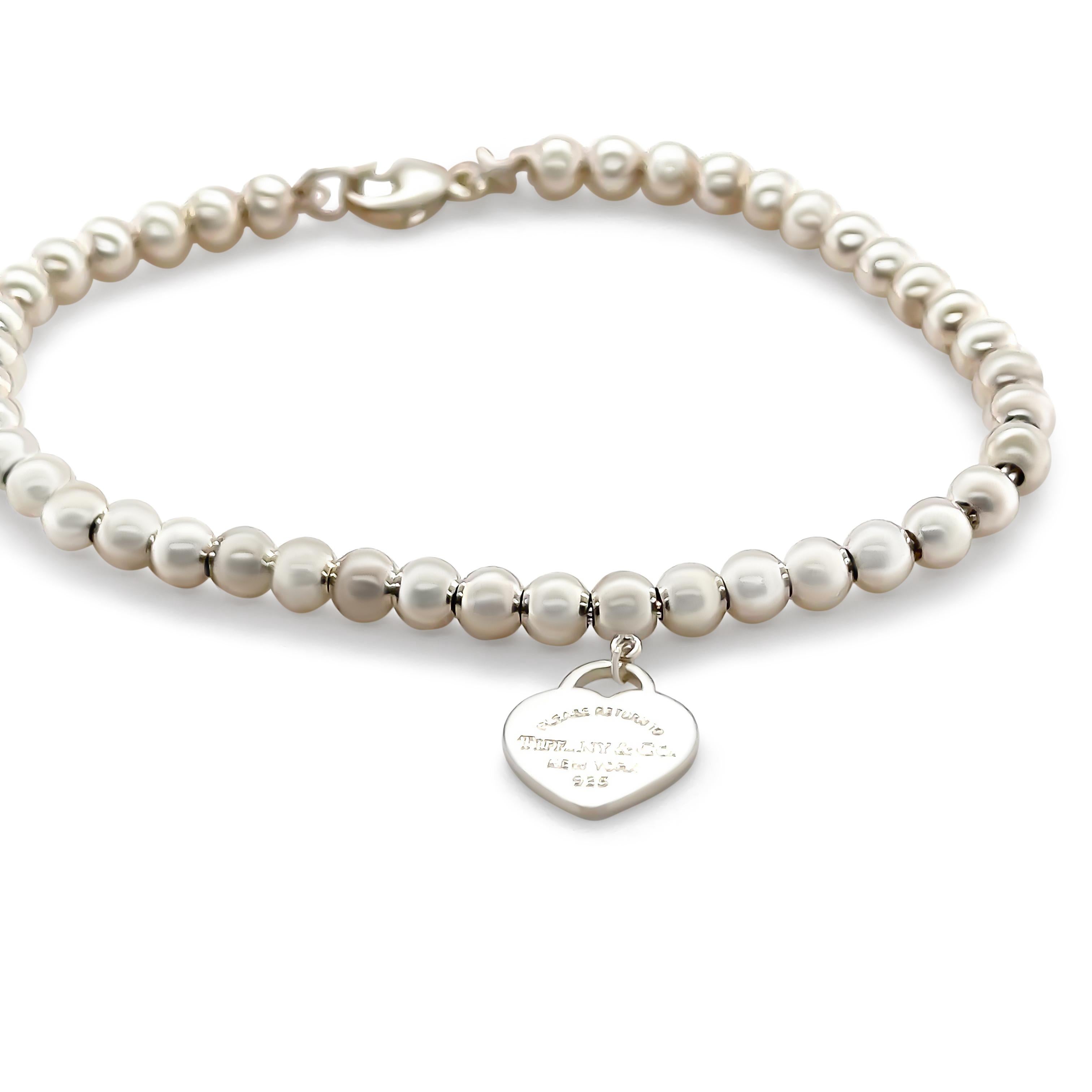 Tiffany and Co Blue Heart Tag Bead Bracelet, made of Sterling Silver. Featuring 4mm beads. Product Number 60136708

Metal: 925 Sterling Silver
Carat: N/A
Colour: N/A
Clarity:  N/A
Cut: N/A
Weight: N/A
Engravings/Markings: Signed Please Return to