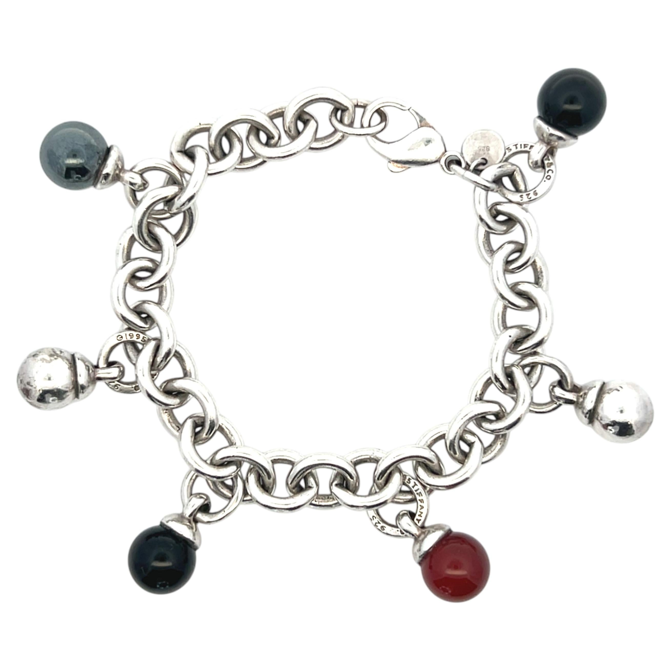 Tiffany & Co. Braccialetto con ciondoli in argento sterling, corniola, onice ed ematite, 1995, pezzo raro