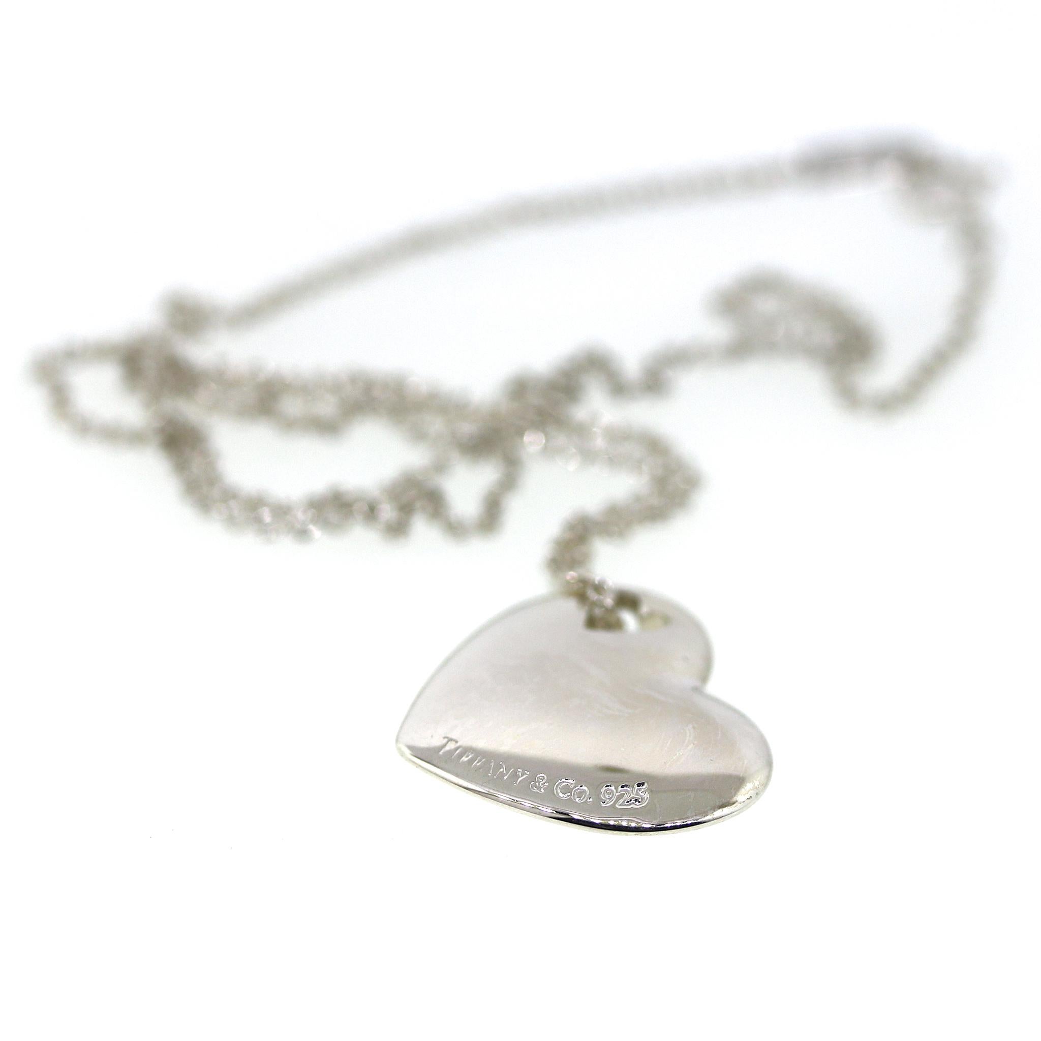 Sterling Silver
Heart Measurement: 20 mm wide, 17 mm long
Chain Length: 16 inches
Total Weight: 8.9 grams