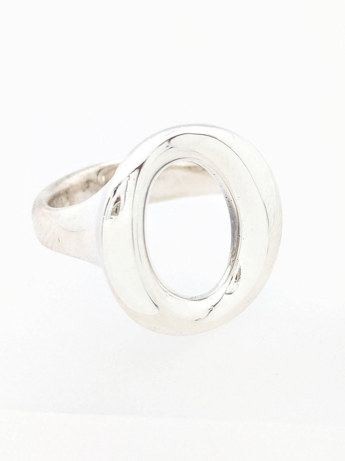 Authentic Tiffany and Co Sterling Silver Elsa Peretti Sevillana O Ring

You are viewing an Authentic Tiffany & Co. Elsa Peretti Sevillana O Ring. This ring is crafted from sterling silver, size 6.5 and weighs 9.3 grams. It is hallmarked 