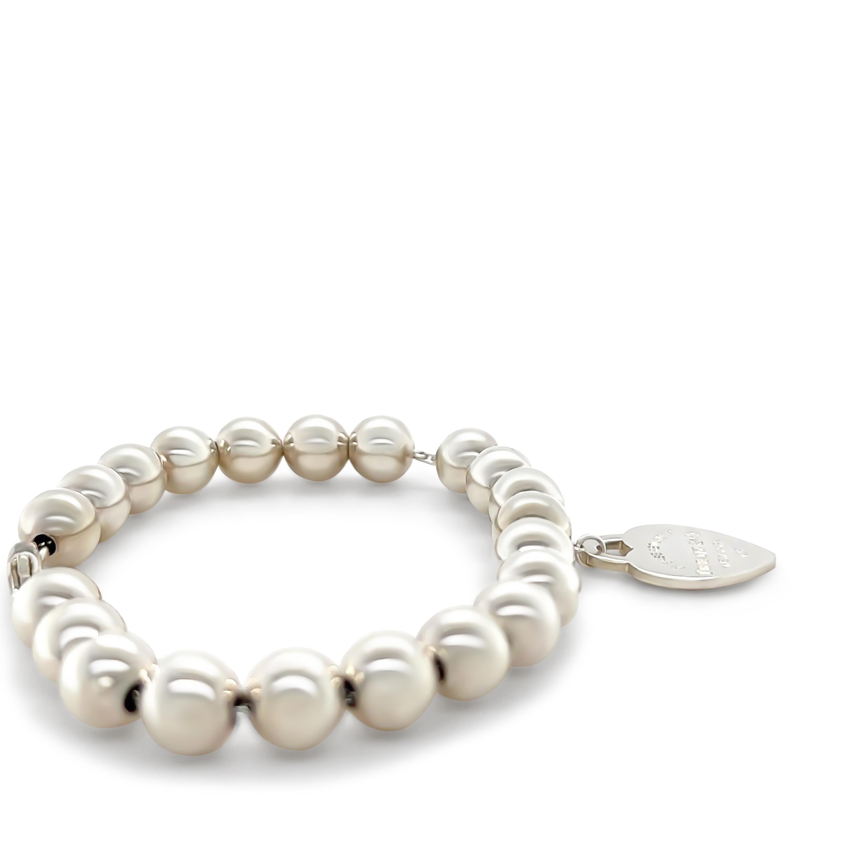 Tiffany and Co Heart Tag Bead Bracelet, made of Sterling Silver. Featuring 4mm beads. Product Number 60130902

Metal: 925 Sterling Silver
Carat: N/A
Colour: N/A
Clarity:  N/A
Cut: N/A
Weight: N/A
Engravings/Markings: Signed Please Return to Tiffany