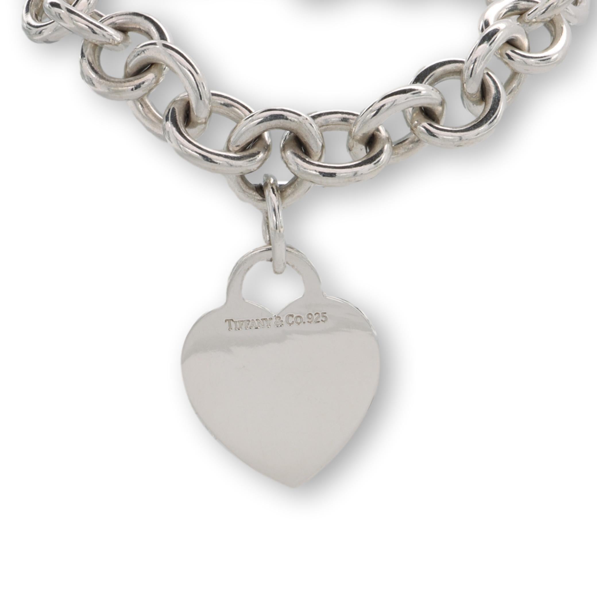 Tiffany & Co. large link necklace from the Return to Tiffany collection finely crafted in fine sterling silver featuring a large heart charm pendant hanging off a 16