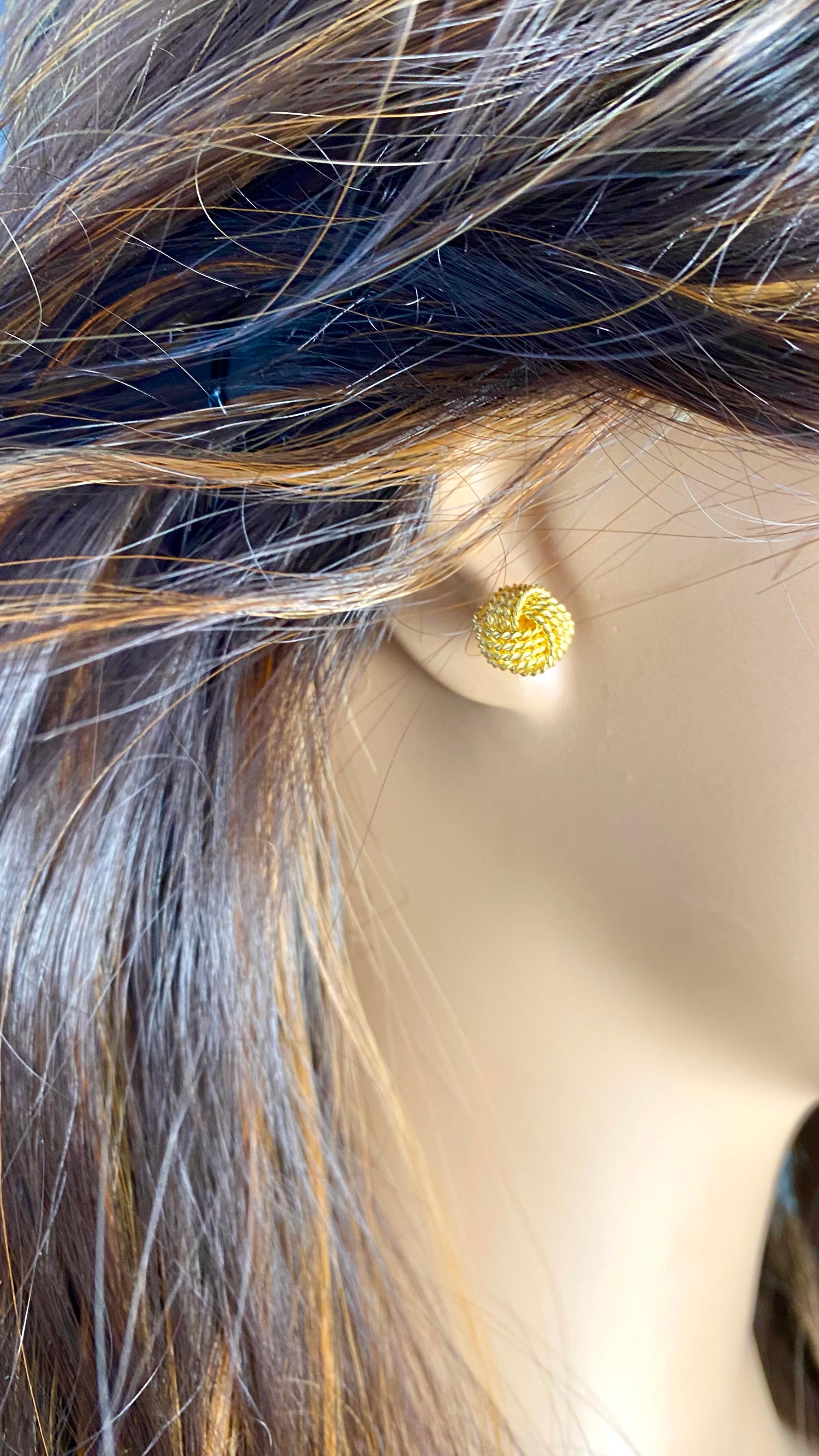 Tiffany and Co Sterling Silver Yellow Gold Plated Love Knot Stud Earrings In Good Condition In New York, NY