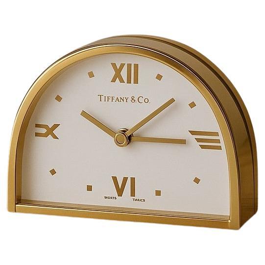 An Exquisite Late 20th-Century Masterpiece
Enhance your space with this elegant Swiss brass half-moon desk timepiece, retailed by Tiffany & Co. during the late 20th century. This sophisticated clock embodies timeless design and exceptional