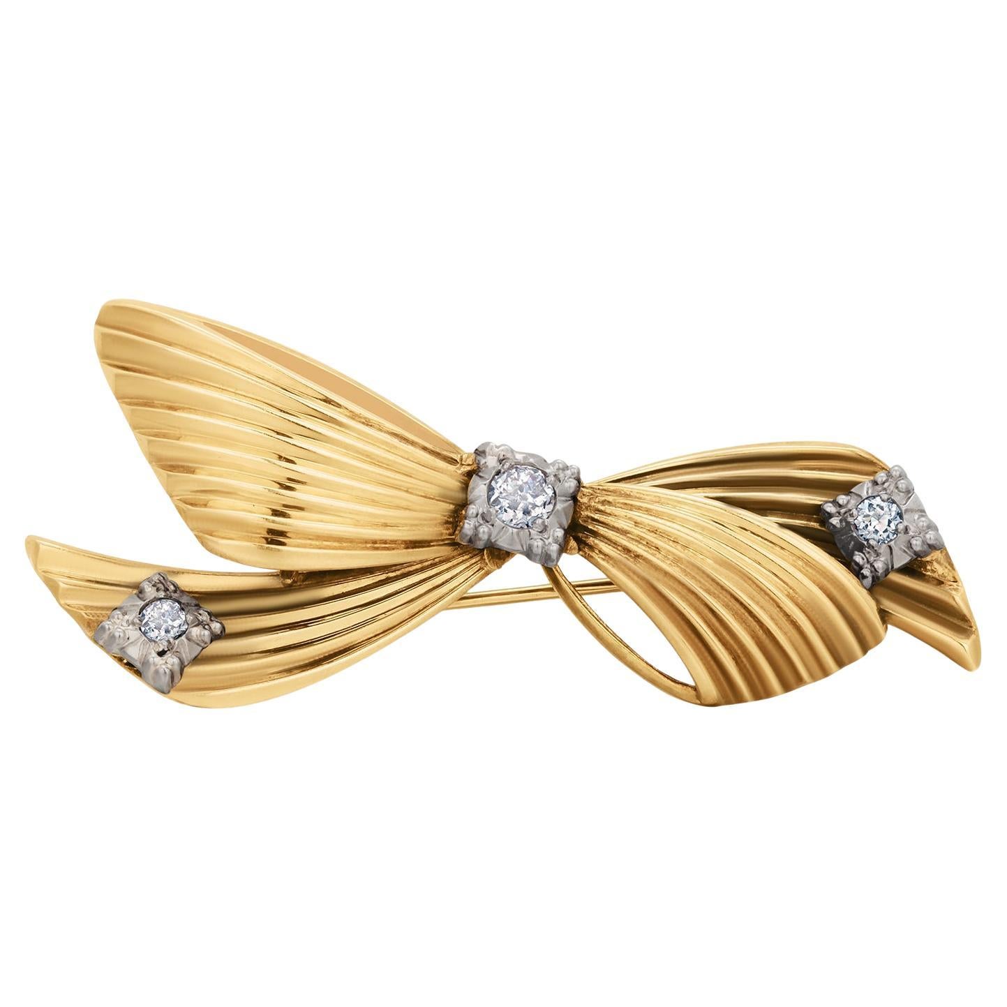 Tiffany & Co. Broche nudo de amor con lazo de diamantes de oro amarillo de 14 quilates vintage