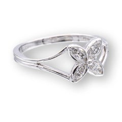 Tiffany and Co. Vintage Victoria Platinum and Marquise Diamond Flower Ring Circa