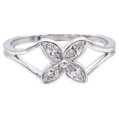 Tiffany and Co. Bague fleur victorienne vintage en platine et diamants marquises, circa