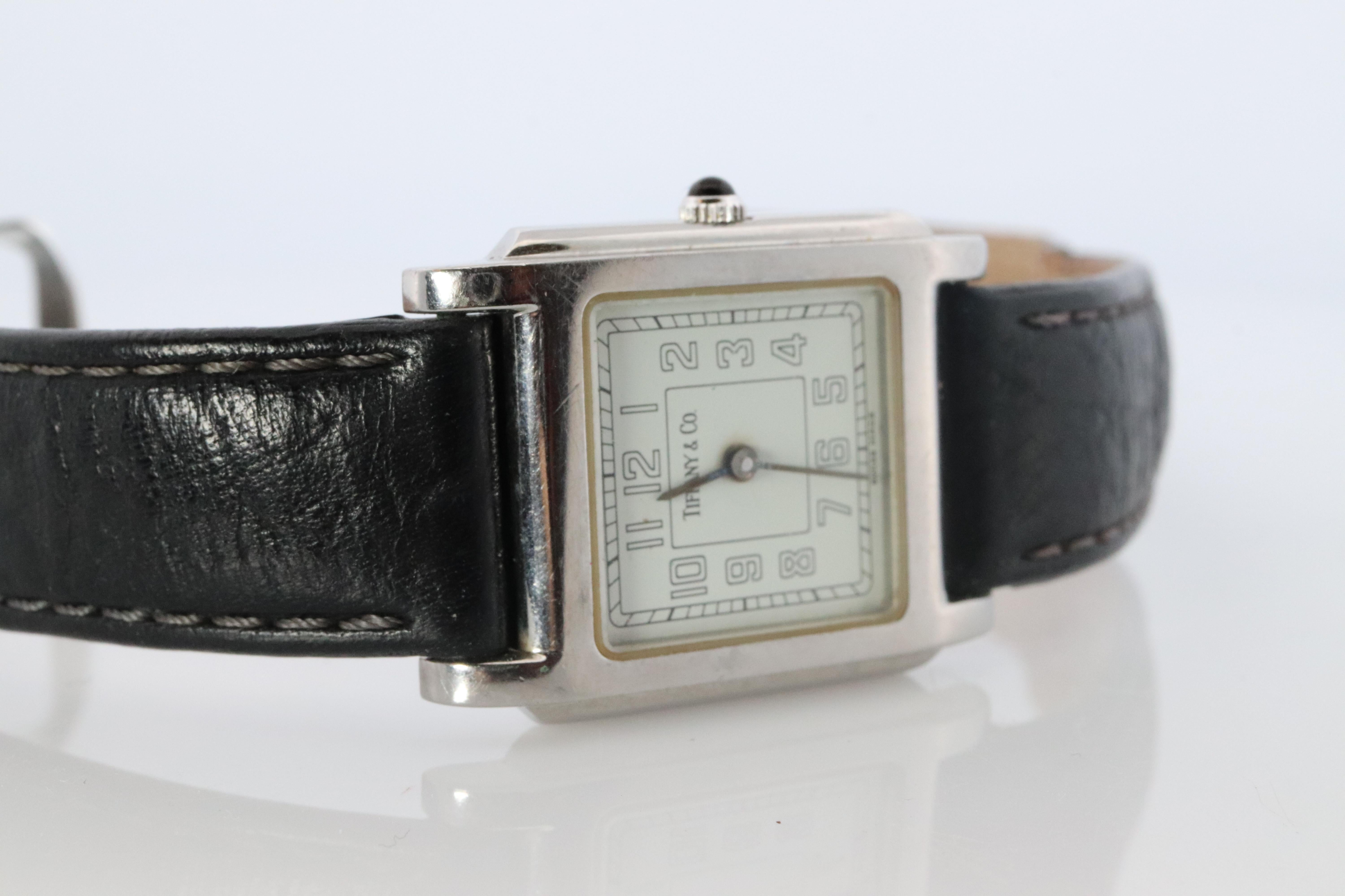 Round Cut Tiffany and Co Watch. Tiffany Tank Quartz Watch. T&CO Square Portfolio. For Sale