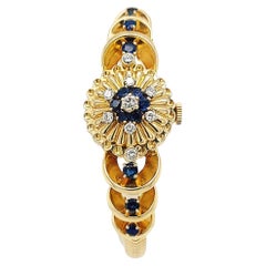Tiffany and Co Yellow Gold Hidden Watch with Sapphires and Diamonds